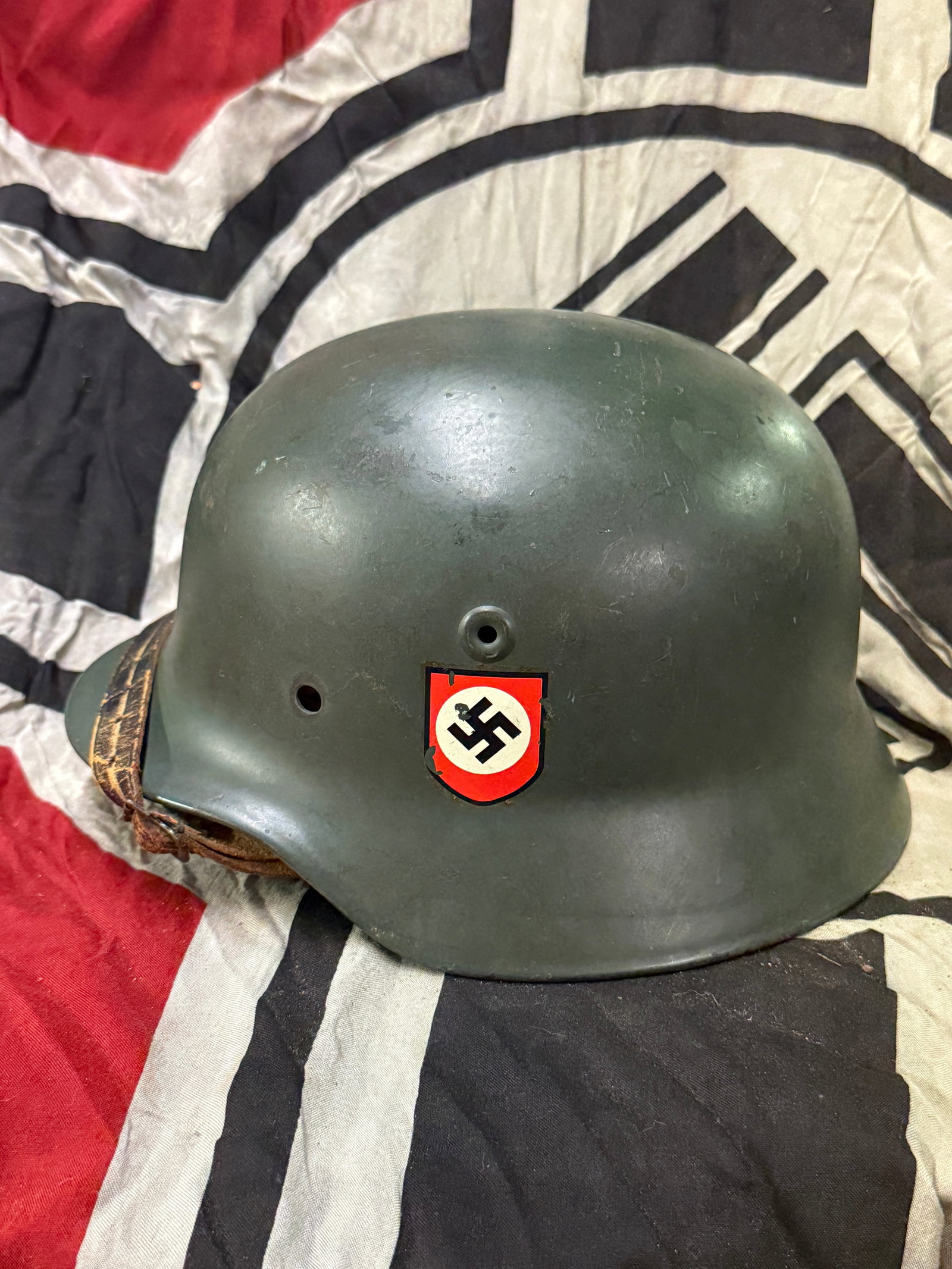 WW2 GERMAN WAFFEN-SS DOUBLE DECAL HELMET WITH LINER: WW2 GERMAN WAFFEN-SS DOUBLE DECAL HELMET WITH LINER. A VERY RARE HELMET THAT IS IN MINT OVERALL SHAPE AND CONDITION WITH A BEAUTIFUL OVERALL PATINA. COMES COMPLETE WITH DOUBLE DECALS AND A LEATHER LIN