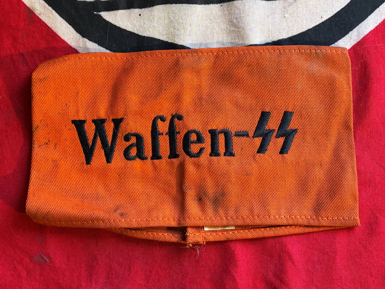 WW2 GERMAN WAFFEN SS ARMBAND WITH RZM PAPER TAG: WW2 GERMAN WAFFEN SS ARMBAND WITH RZM PAPER TAG. AN ULTRA RARE FIND THAT IS IN MINT OVERALL SHAPE AND CONDITION WITH A BEAUTIFUL OVERALL PAITNA. SHOWS GOOD WEAR AND USE. PLEASE VIEW ALL DETAILED PICTU