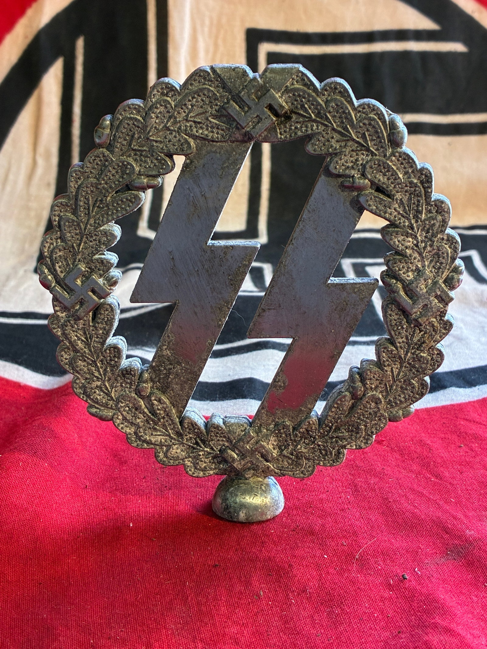 WW2 GERMAN WAFFEN SS DESK ORNAMENT: WW2 GERMAN WAFFEN SS DESK ORNAMENT. A VERY RARE FIND. SHOWS GOOD WEAR AND USE WITH A BEAUTIFUL OVERALL PATINA. A RARE EXAMPLE.