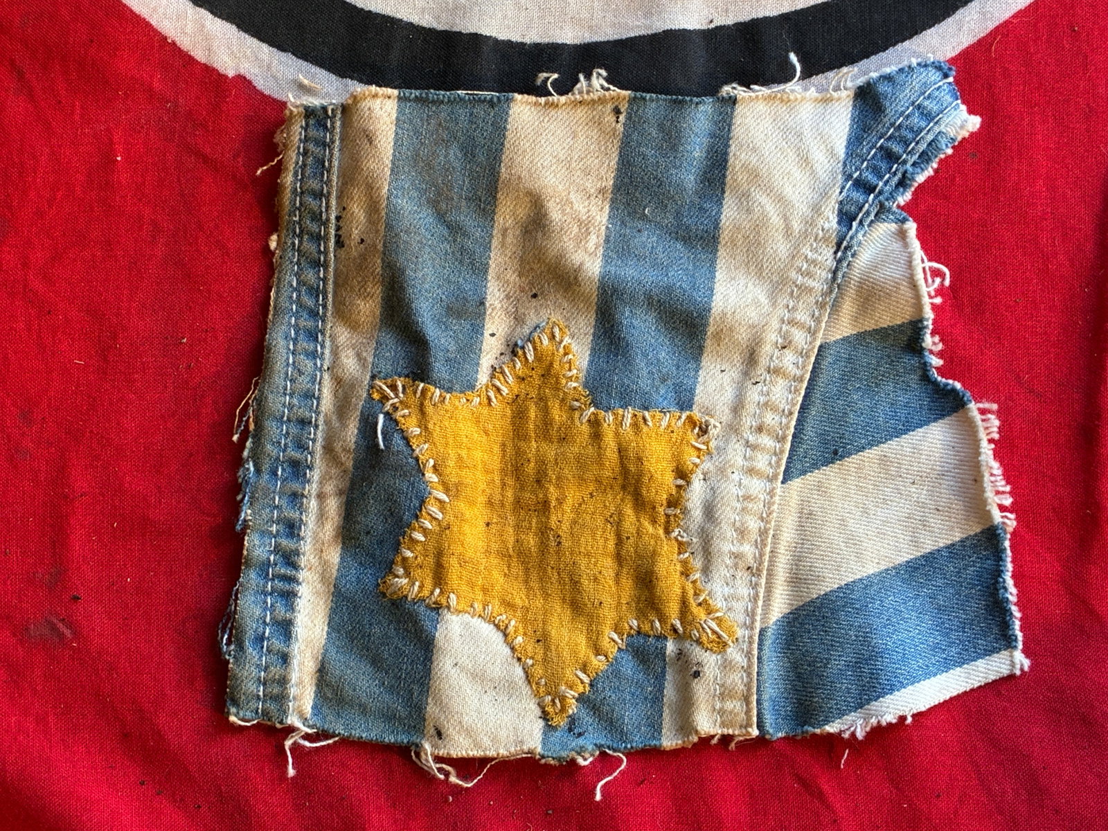 WW2 GERMAN JEWISH CONCENTRATION CAMP STAR OF DAVID UNIFORM CUT OUT: WW2 GERMAN JEWISH CONCENTRATION CAMP STAR OF DAVID UNIFORM CUT OUT. A VERY RARE FIND. SHOWS GOOD WEAR AND USE WITH A BEAUTIFUL OVERALL PATINA. PLEASE VIEW ALL DETAILED PICTURES. A RARE EXAMPLE.
