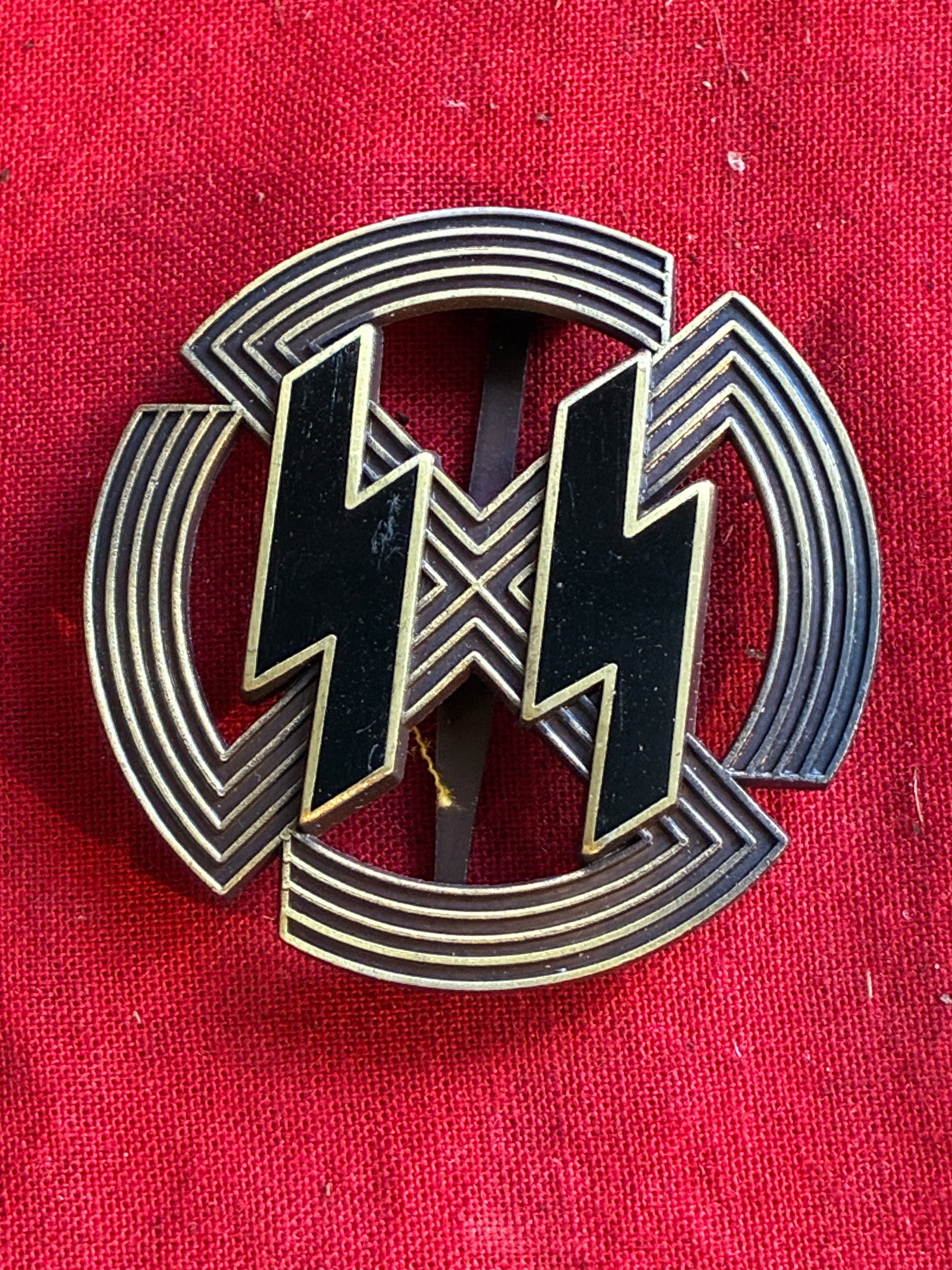 WW2 German SS Proficiency Sport Badge in Bronze By RZM M1/25: WW2 German SS Proficiency Sport Badge in Bronze By RZM M1/25. A VERY RARE FIND. SHOWS GOOD WEAR AND USE WITH A BEAUTIFUL OVERALL PATINA. MAKER MARKED ON THE REVERSE. PLEASE VIEW ALL DETAILED PICTURES.