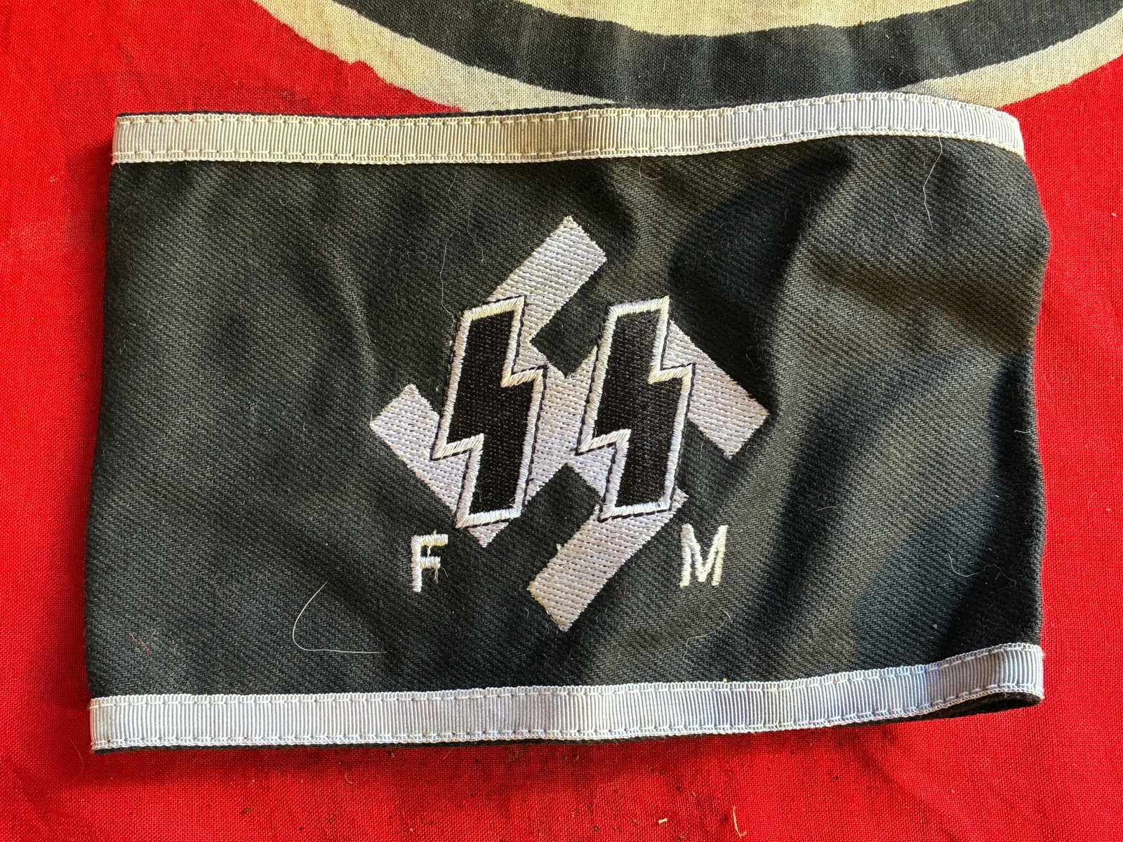 RARE WW2 GERMAN SS FM ARMBAND W/SS RZM TAG: RARE WW2 GERMAN SS FM ARMBAND W/SS RZM TAG. A VERY RARE FIND. SHOWS GOOD WEAR AND USE WITH A BEAUTIFUL OVERALL PATINA. PLEASE VIEW ALL DETAILED PICTURES. A RARE EXAMPLE OF THE TIME PERIOD.