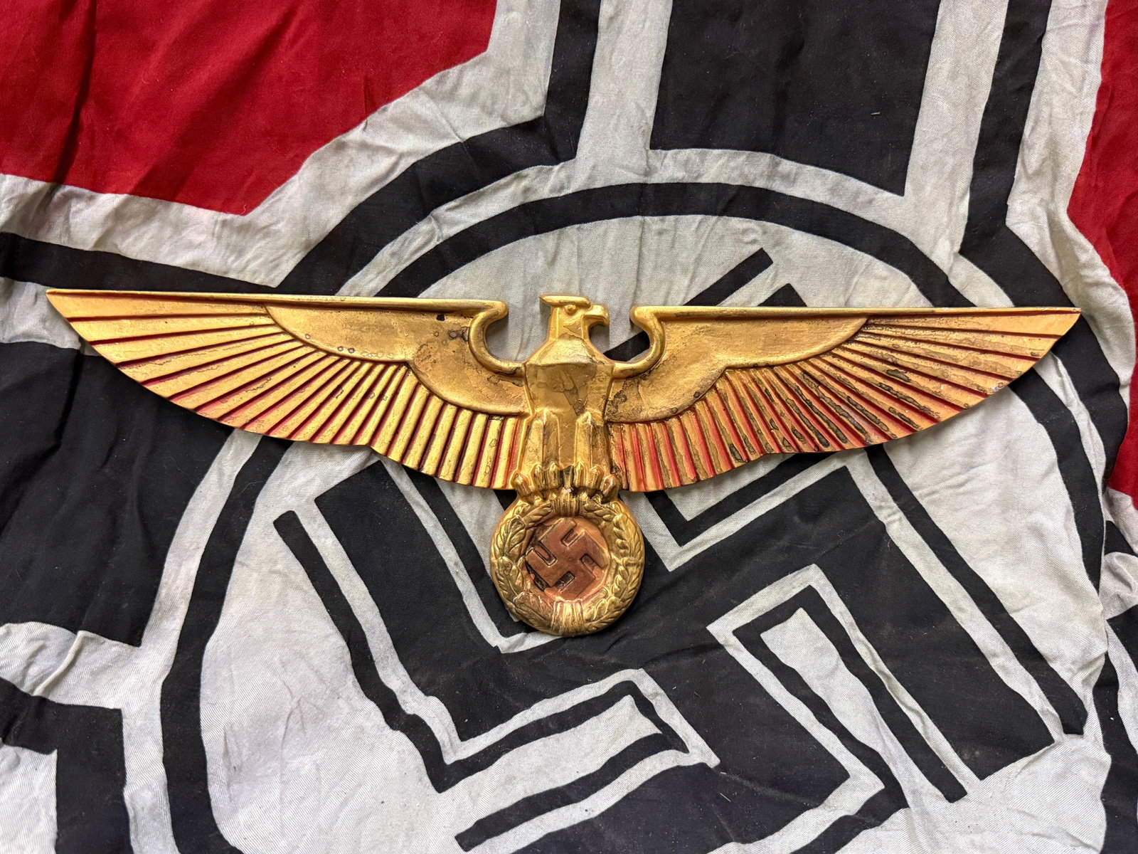 ULTRA RARE WW2 GERMAN REICHSTAG WALL EAGLE PLAQUE: ULTRA RARE WW2 GERMAN REICHSTAG WALL EAGLE PLAQUE. A VERY RARE FIND. SHOWS GOOD WEAR AND USE WITH A BEAUTIFUL OVERALL PATINA. COMES FROM A LARGE COLLECTION. PLEASE VIEW ALL DETAILED PICTURES. A RARE E