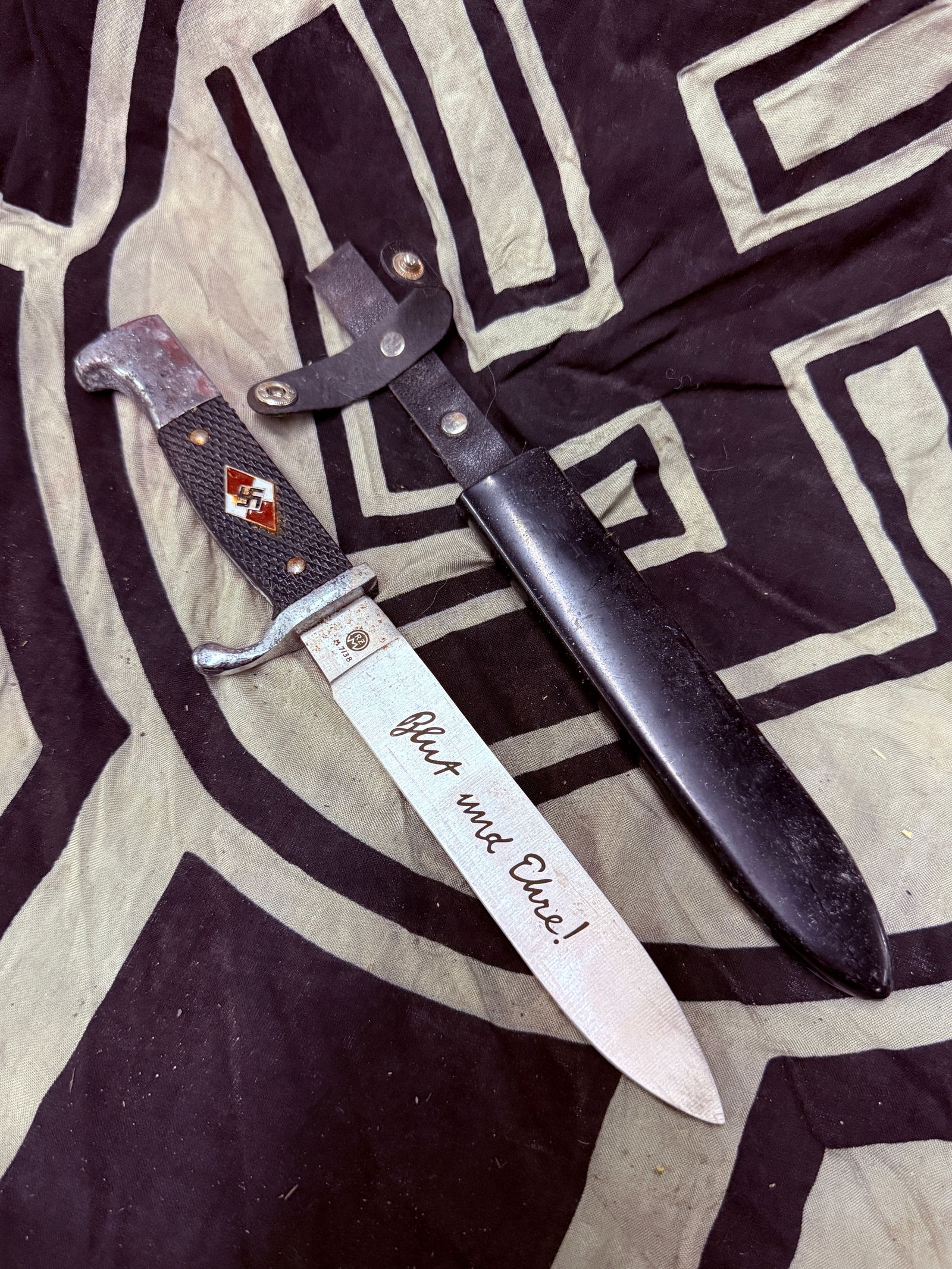 RARE WW2 GERMAN HITLER YOUTH DAGGER WITH SHEATH BY RZM M7/38: RARE WW2 GERMAN HITLER YOUTH DAGGER WITH SHEATH BY RZM M7/38. A VERY RARE EXAMPLE THAT IS IN MINT OVERALL SHAPE AND CONDITION WITH A BEAUTIFUL OVERALL PATINA. ENGRAVED BLADE "BLUT UND EHRE". SHOWS GOO