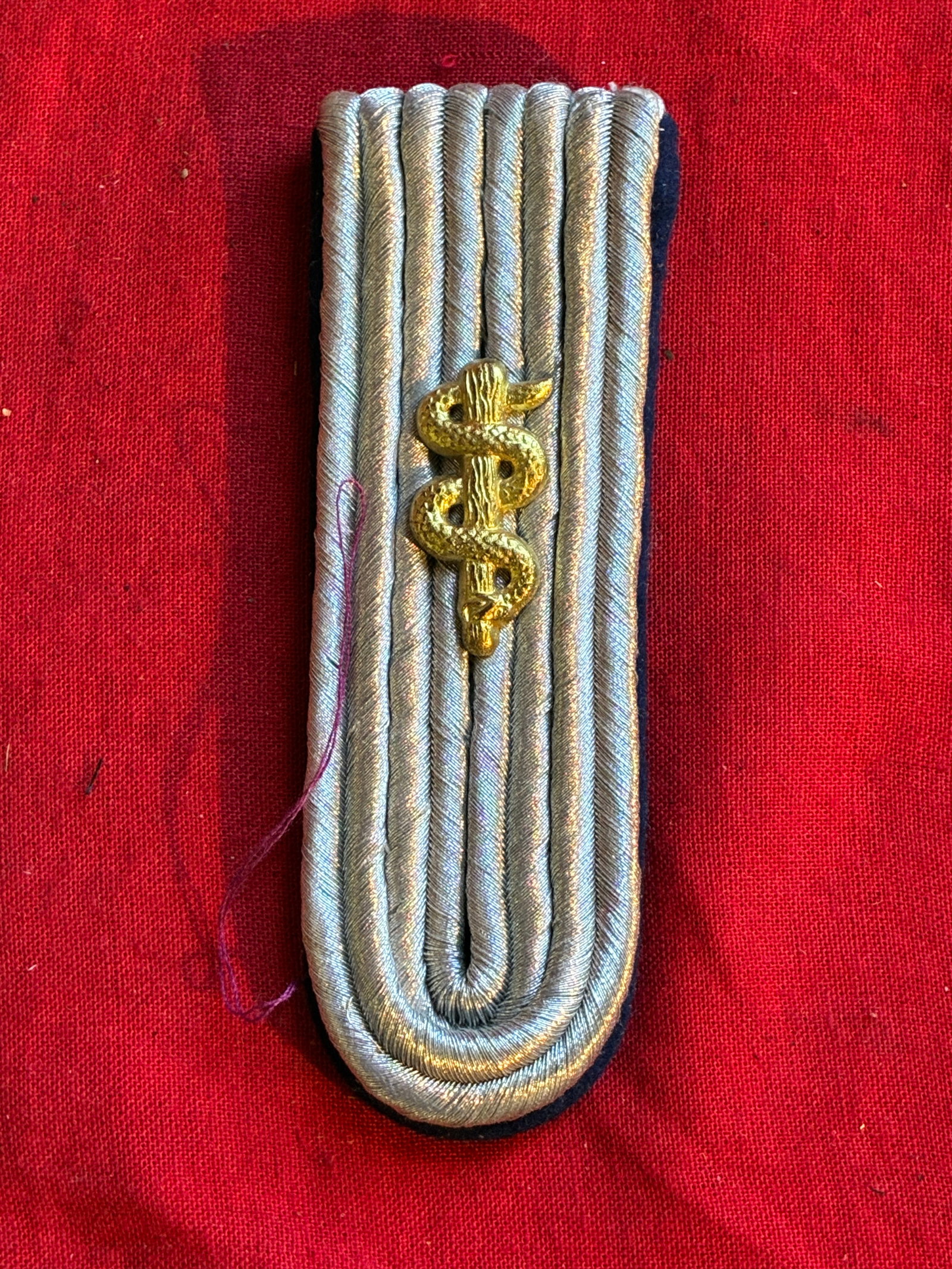 WW2 German medical jacket shoulder board: WW2 German medical jacket shoulder board. In good used shape and condition with a beautiful overall patina. Please view all detailed pictures. A rare example of the time period.