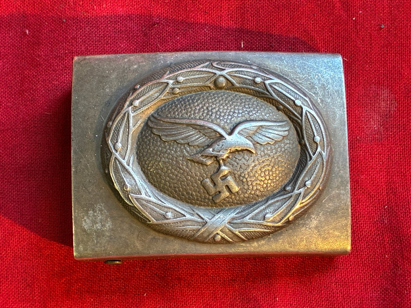 Rare WW2 German Luftwaffe Afrika Korps Belt Buckle: Rare WW2 German Luftwaffe Afrika Korps Belt Buckle. A very rare find. Shows good wear and use with a beautiful overall patina. The steel Buckle shows minor wear only to the high points on the eagle wi