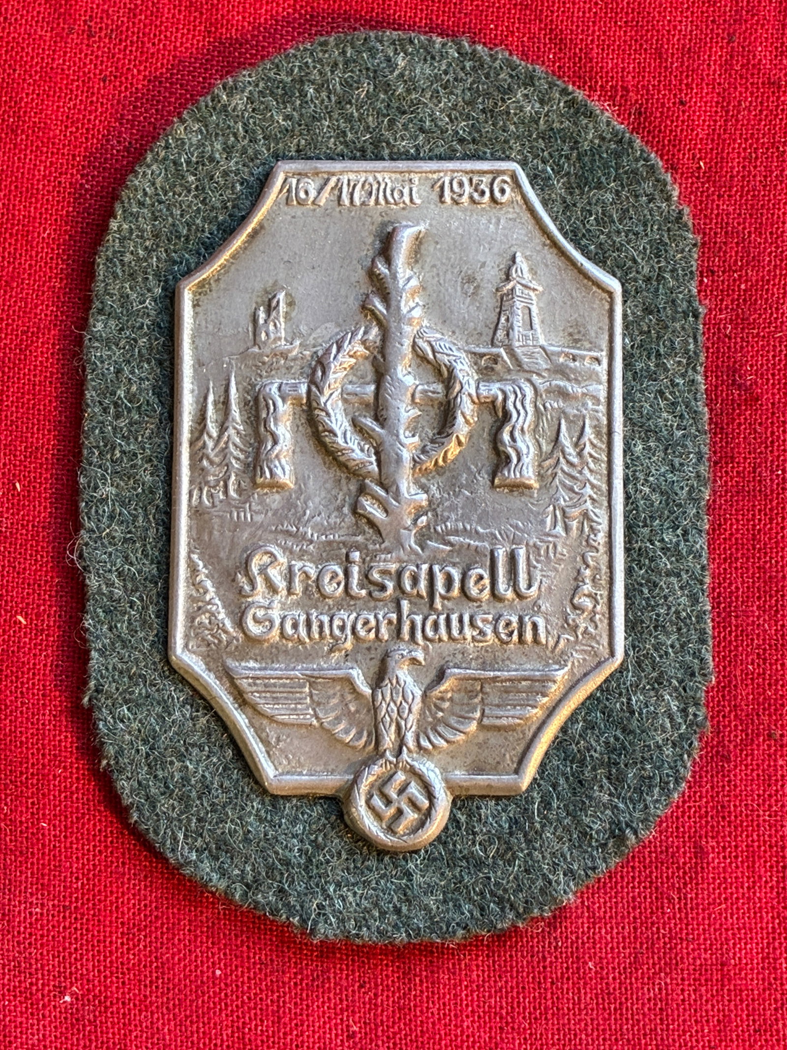 WW2 German 1943 NSKK Motorgruppe 'Oberdonau' award: WW2 German 1943 NSKK Motorgruppe 'Oberdonau' award. A rare example. Shows good wear and use with a beautiful overall patina. Award is on green cloth backing. Please view all detailed pictures. A rare 