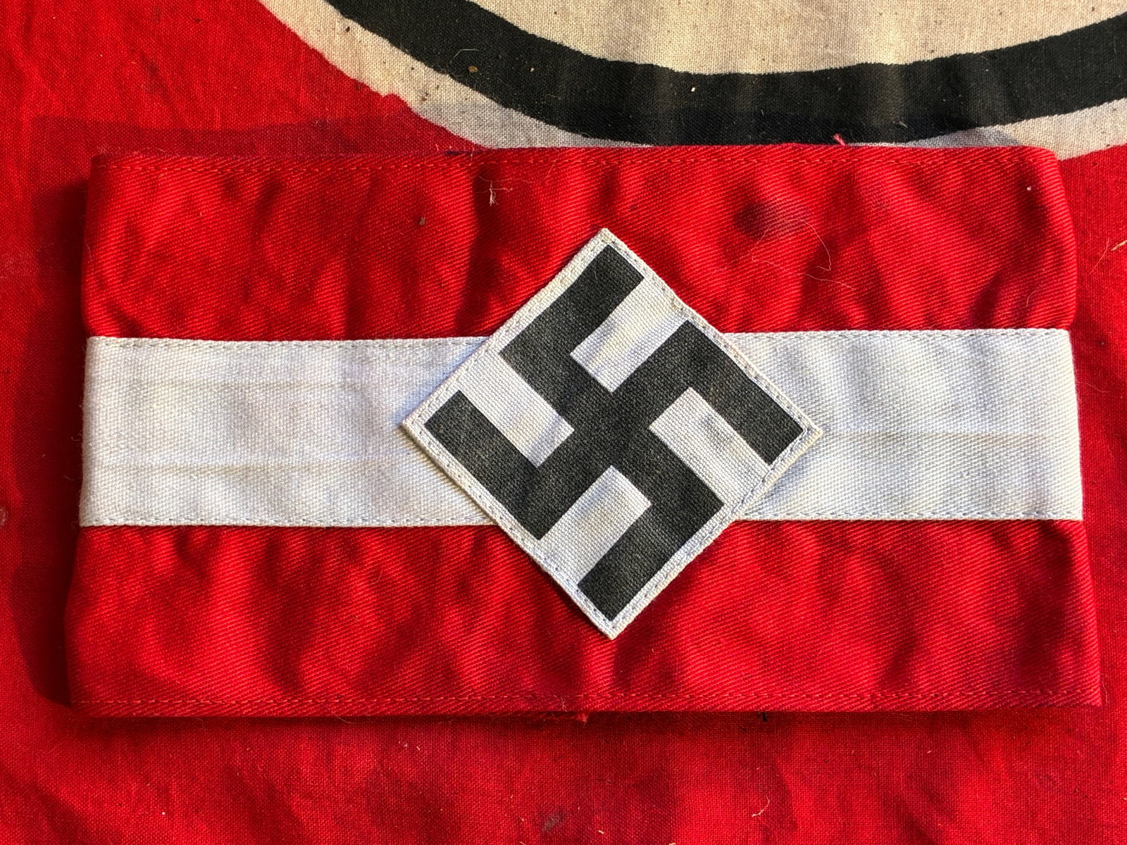 WW2 German Hitler Youth Armband With RZM Paper Tag: WW2 German Hitler Youth Armband With RZM Paper Tag. A rare find. Shows good wear and use with a beautiful overall patina. Please view all detailed pictures. A rare example of the time period.
