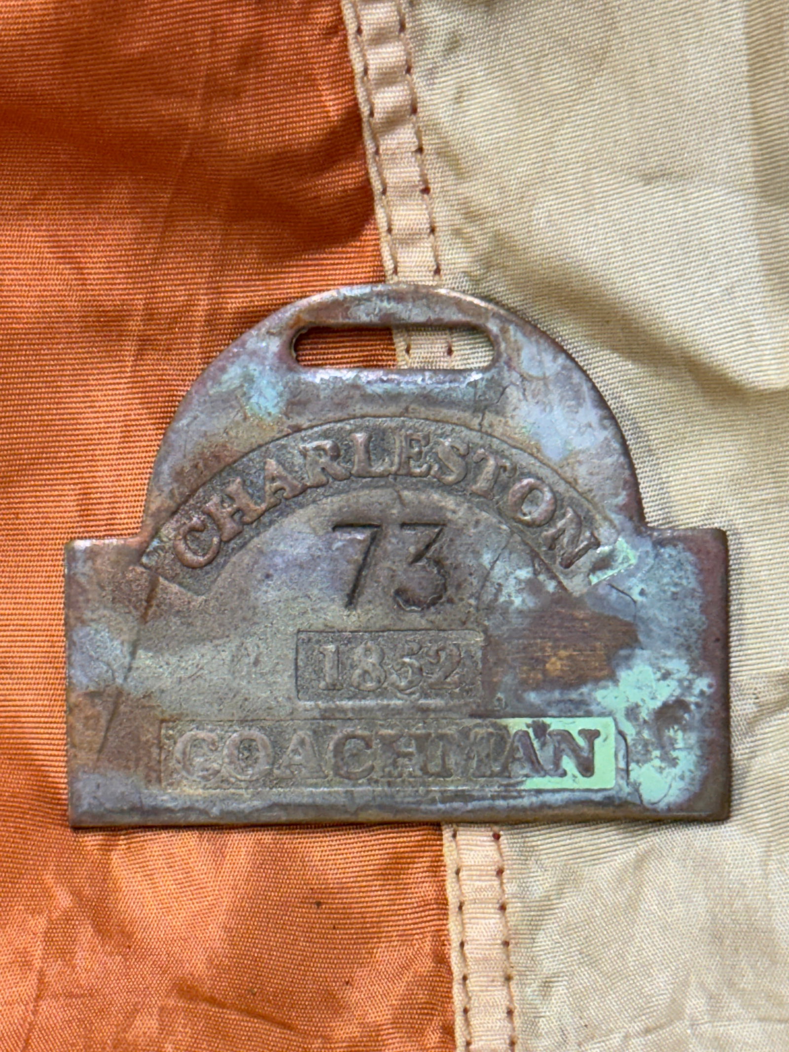 DATED 1852 CHARLESTON #73 COACHMAN SLAVE TAG SERVANT ID: DATED 1852 CHARLESTON #73 COACHMAN SLAVE TAG SERVANT ID. A VERY RARE FIND. SHOWS GOOD WEAR AND USE WITH A BEAUTIFUL OVERALL PATINA. HAS A GREAT LOOK TO IT WITH AN EXCELLENT OVERALL EYE APPEAL. PLEASE 