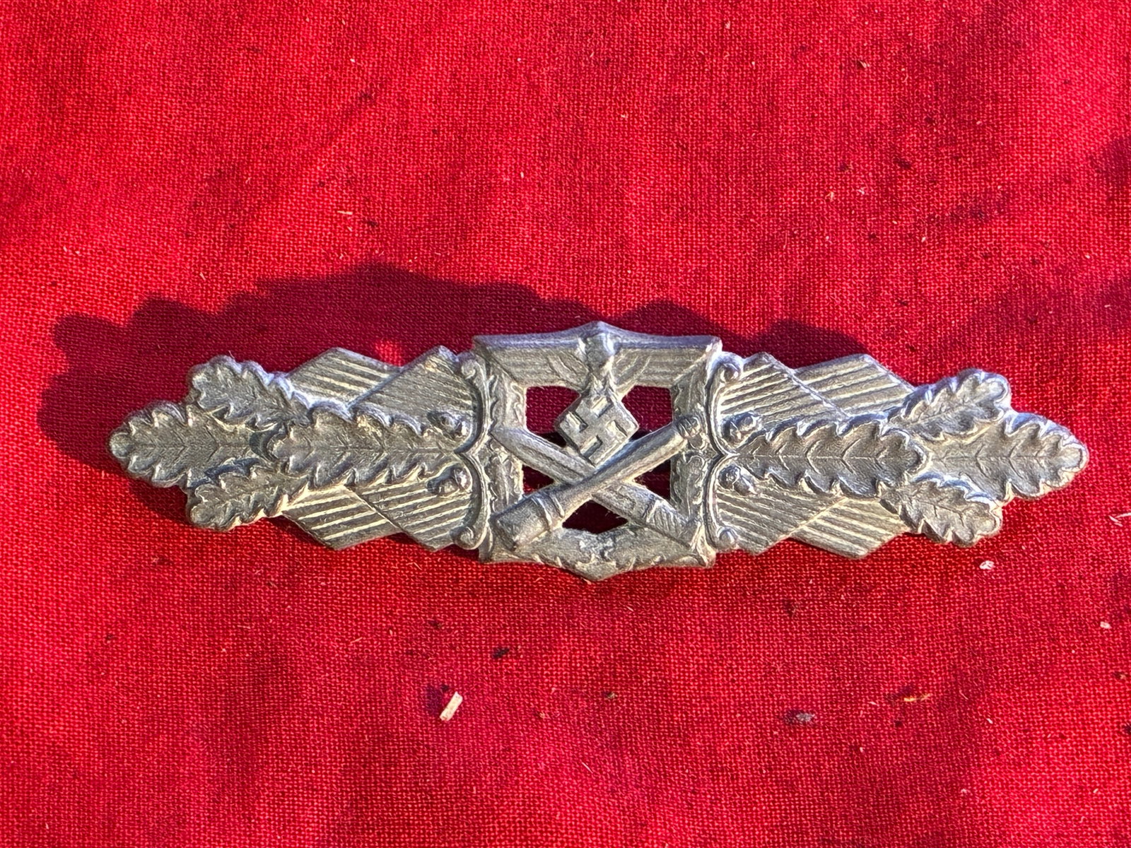 WWII German Maker Marked CLOSE COMBAT CLASP IN Silver By FLL: WWII German Maker Marked CLOSE COMBAT CLASP IN Silver. The Close Combat Clasp series of awards were introduced on November 25TH 1942 for award to personnel who fought in hand-to-hand combat situations