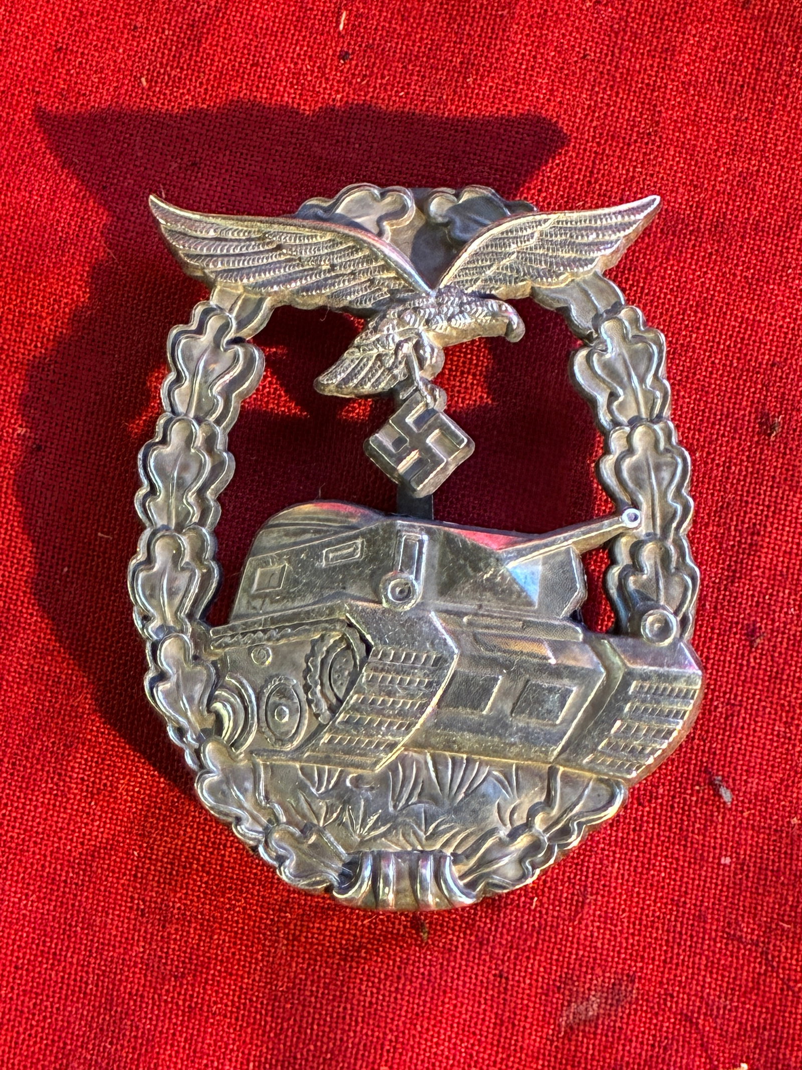 RARE LATE WAR UNMARKED LW PANZER ASSAULT BADGE FOR “HERMAN GORING “ DIVISION: RARE LATE WAR UNMARKED LW PANZER ASSAULT BADGE FOR “HERMAN GORING “ DIVISION. The super dye struck detail with no damage to front of the badge really makes this a great find. A very rare example.