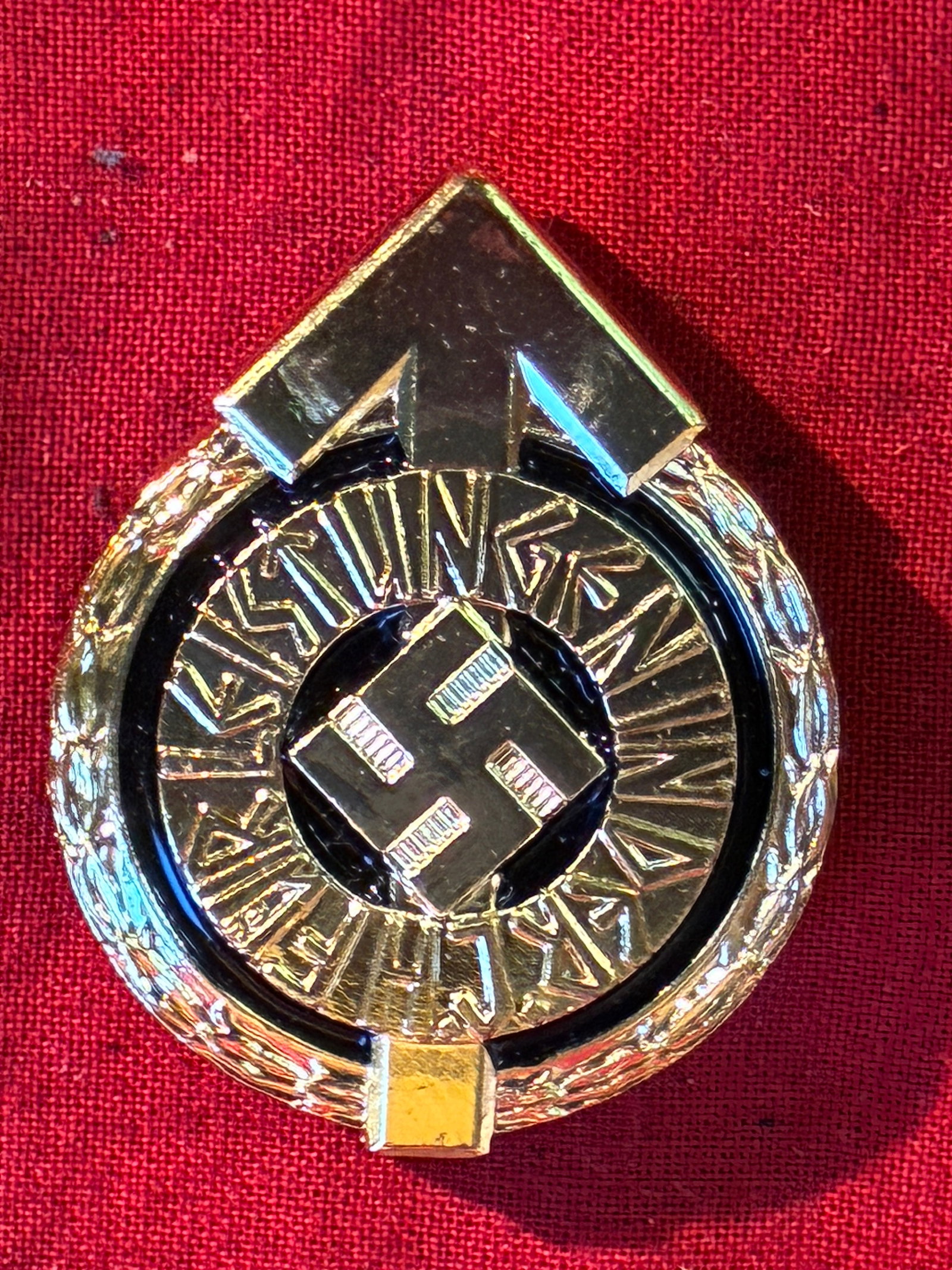 WW2 GERMAN HITLER YOUTH LEADERS SPORTS BADGE IN GOLD BY Gustav Brehmer, Markneukrichen RZM WITH: WW2 GERMAN HITLER YOUTH LEADERS SPORTS BADGE IN GOLD BY Gustav Brehmer, Markneukrichen RZM WITH SERIAL NUMBER 2223. Early tombac construction ‘Führer Sportabzeichen in Gold’ with RZM 1/101 mark f