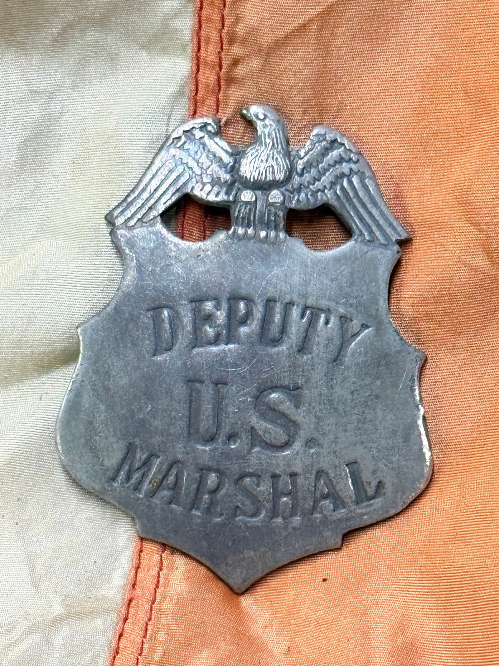 ANTIQUE 1800'S DEPUTY U.S. MARSHAL BADGE: ANTIQUE 1800'S DEPUTY U.S. MARSHAL BADGE. A VERY RARE FIND. MAKER MARKED ON THE BLADE. SHOWS GOOD WEAR AND USE WITH A BEAUTIFUL OVERALL PATINA. A VERY RARE FIND AND AN EXCEPTIONAL ADDITION TO YOUR COL