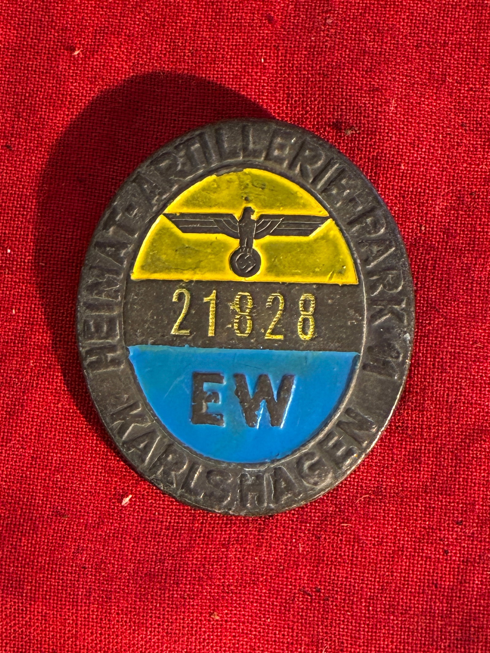 WW2 German artillery karlshagen badge no 21828: WW2 German artillery karlshagen badge no 21828. Shows good wear and use with a beautiful overall patina. Please view all detailed pictures. A rare example of the time period.