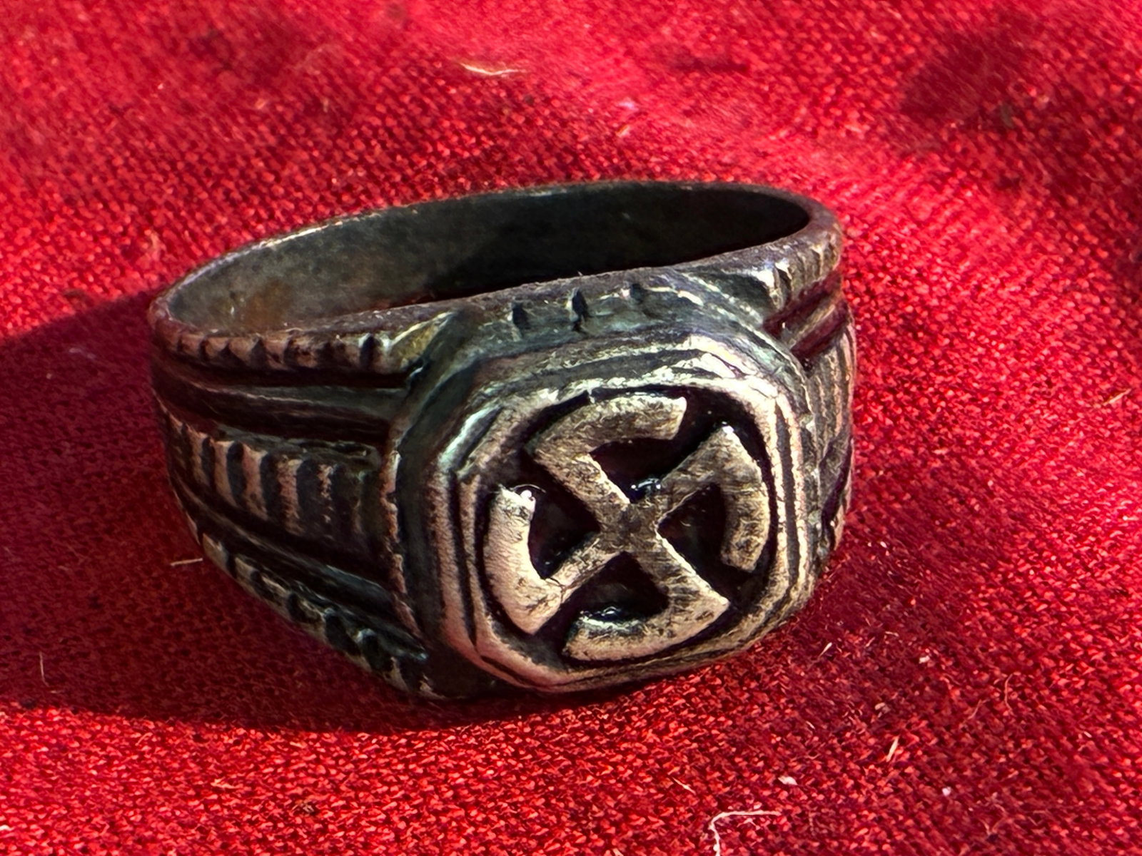WW2 GERMAN HAKENKREUZ WIKING RING IN 800 SILVER: WW2 GERMAN HAKENKREUZ WIKING RING IN 800 SILVER. A RARE FIND. SHOWS GOOD WEAR AND USE WITH A BEAUTIFUL OVERALL PATINA. PLEASE VIEW ALL DETAILED PICTURES. A RARE EXAMPLE OF THE TIME PERIOD.