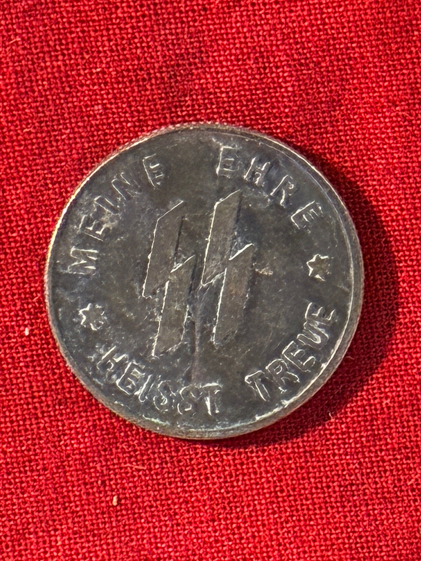 WW2 GERMAN SS KAMPFT WEITER 1 SCHILLING SS COIN 1940 KANTINEGELD: WW2 GERMAN SS KAMPFT WEITER 1 SCHILLING SS COIN 1940 KANTINEGELD. A RARE FIND THAT IS IN MINT OVERALL SHAPE AND CONDITION WITH A BEAUTIFUL OVERALL PATINA. PLEASE VIEW ALL DETAILED PICTURES. A RARE EXA