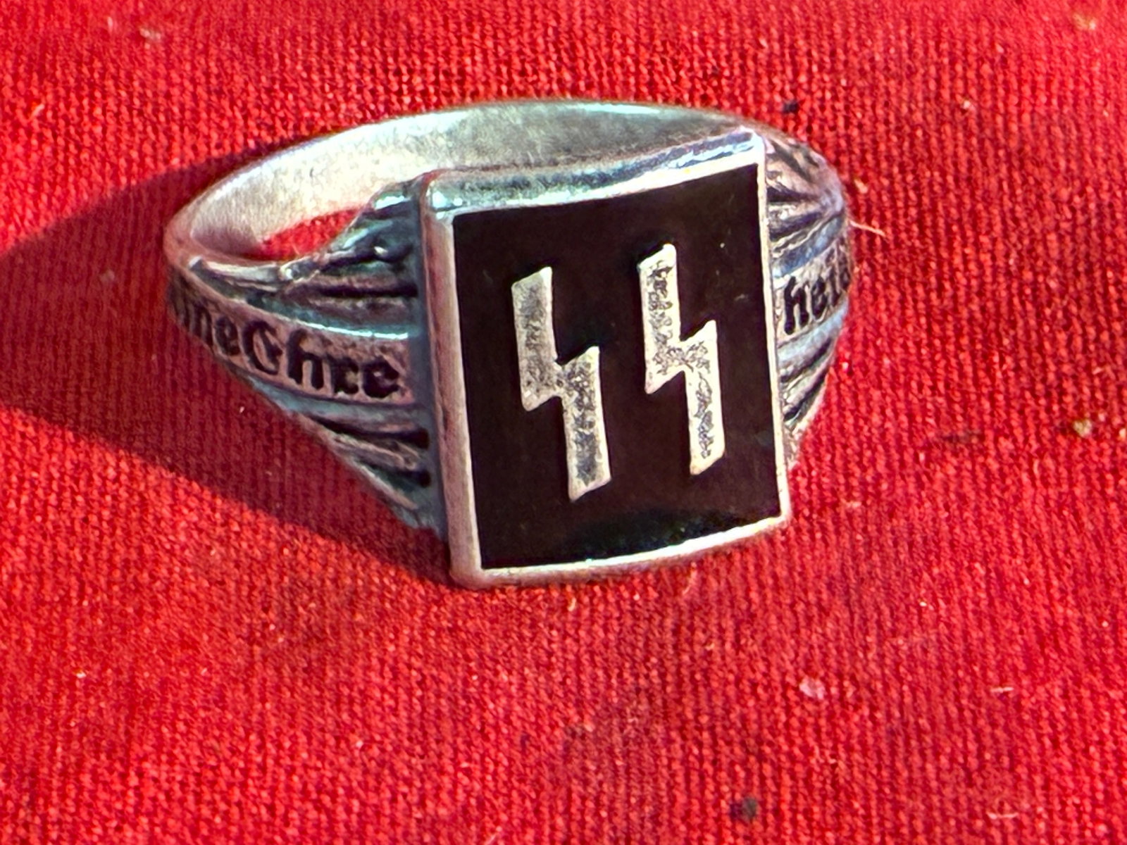 WW2 GERMAN WAFFEN SS ENAMELED "MEINE EHRE HEISST TREUE" 800 SILVER RING: WW2 GERMAN WAFFEN SS ENAMELED "MEINE EHRE HEISST TREUE" 800 SILVER RING. A VERY RARE FIND THAT IS IN MINT OVERALL SHAPE AND CONDITION WITH A BEAUTIFUL OVERALL PATINA. SHOWS GOOD WEAR AND USE. PLEASE V