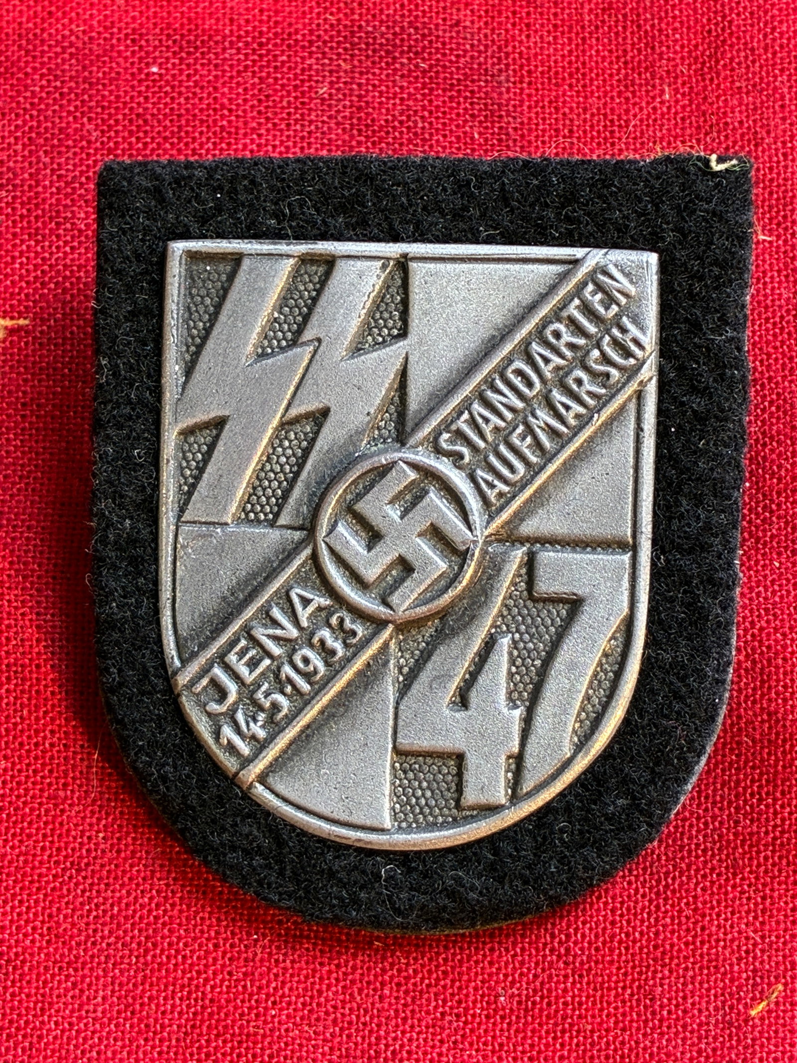 RARE WW2 GERMAN SS STANDARTEN 47 PARADE BADGE BY RZM: RARE WW2 GERMAN SS STANDARTEN 47 PARADE BADGE BY RZM. A VERY RARE EXAMPLE THAT IS IN MINT OVERALL SHAPE AND CONDITION WITH A BEAUTIFUL OVERALL PATINA. SHOWS GOOD WEAR AND USE. PLEASE VIEW ALL DETAILED