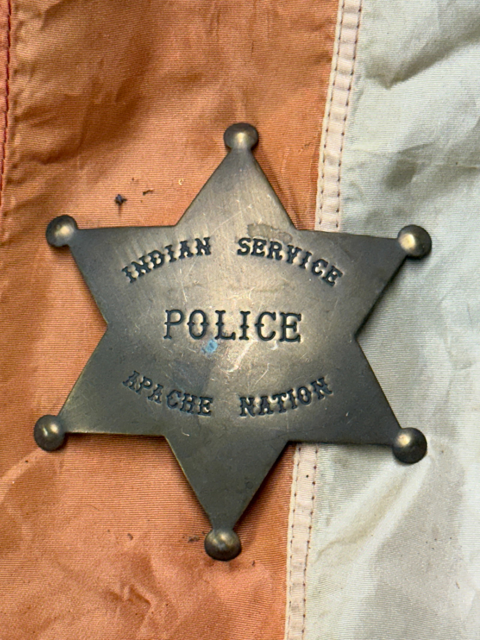 1800'S INDIAN SERVICE POLICE APACHE NATION BADGE: 1800'S INDIAN SERVICE POLICE APACHE NATION BADGE. A VERY RARE FIND. MAKER MARKED ON THE BLADE. SHOWS GOOD WEAR AND USE WITH A BEAUTIFUL OVERALL PATINA. A VERY RARE FIND AND AN EXCEPTIONAL ADDITION TO 