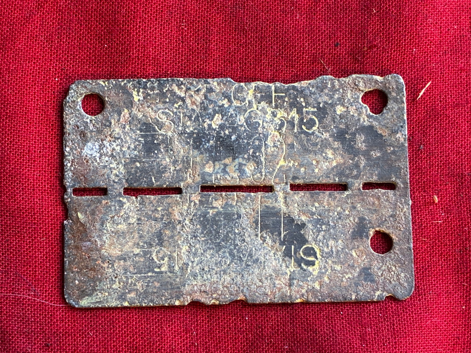 RARE WW2 GERMAN OFFICER DOG TAG - UNCUT VERSION: RARE WW2 GERMAN OFFICER DOG TAG - UNCUT VERSION. A VERY RARE FIND. SHOWS GOOD WEAR AND USE WITH A BEAUTIFUL OVERALL PATINA. PLEASE VIEW ALL DETAILED PICTURES. A RARE EXAMPLE OF THE TIME PERIOD.