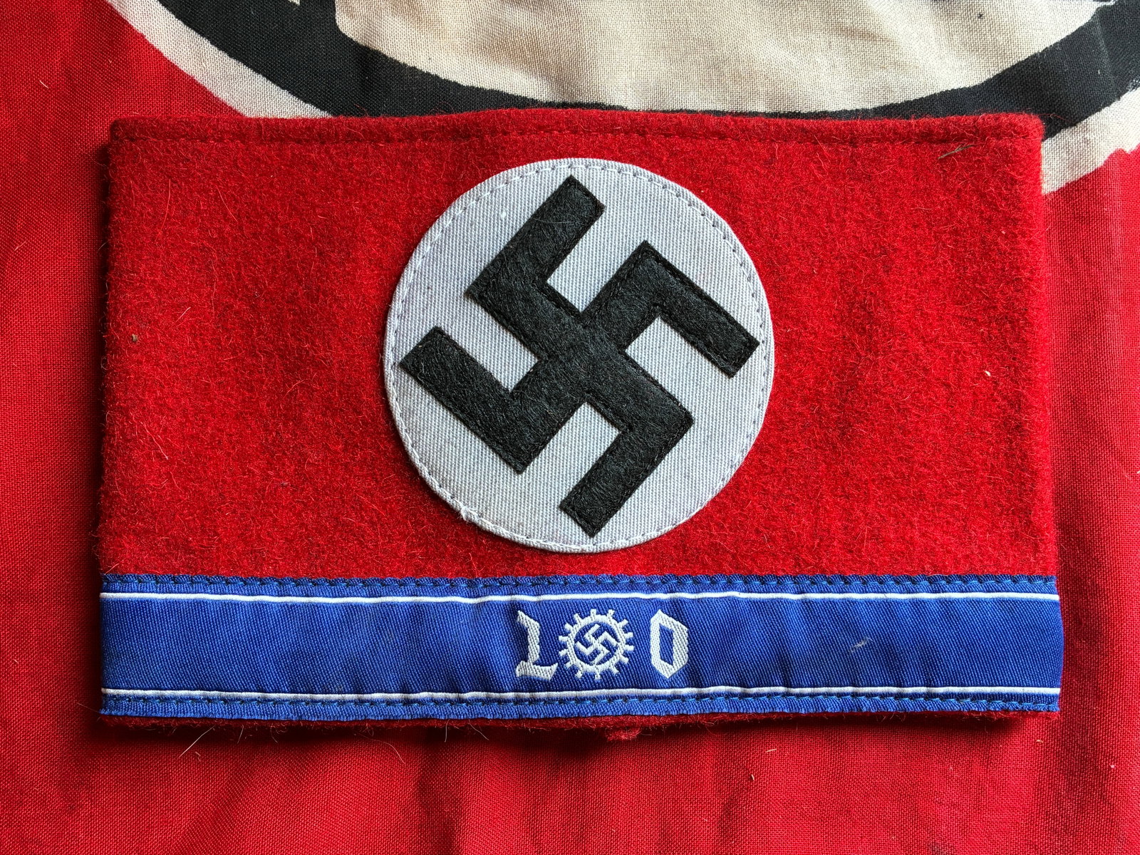 WW2 GERMAN NSDAP LABOR CORPS FIELD USED TUNIC ARMBAND WITH RZM PAPER TAG: WW2 GERMAN NSDAP LABOR CORPS FIELD USED TUNIC ARMBAND WITH RZM PAPER TAG. AN ULTRA RARE FIND. SHOWS GOOD WEAR AND USE WITH A BEAUTIFUL OVERALL PATINA. SHOWS GOOD WEAR AND USE. PLEASE VIEW ALL DETAILED