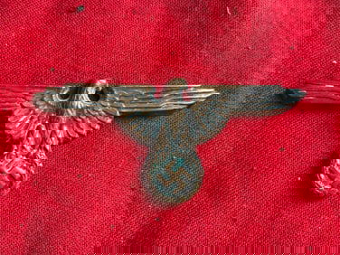 WW2 GERMAN C. 1939 SS VISOR CAP EAGLE IN SILVER PLATE BRASS MAKER MARKED RZM