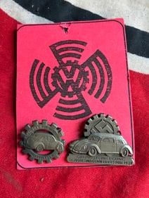 SET OF (2) WW2 GERMAN VOLKSWAGEN FACTORY WORKS TUNIC BADGES ON ORIGINAL PAPER TAG