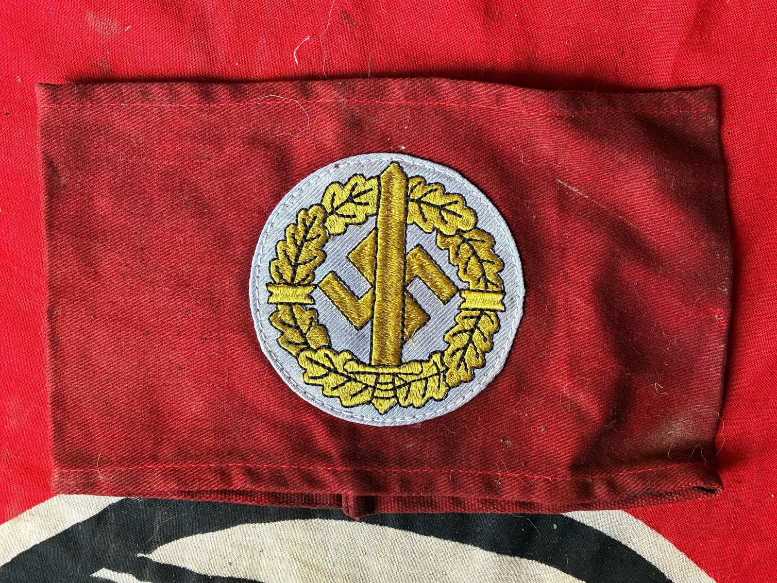 RARE WW2 GERMAN SA SPORTS ASSOCIATION ARMBAND: RARE WW2 GERMAN SA SPORTS ASSOCIATION ARMBAND. SA Sports Badge Association wool armband, with gold bullion thread. The SA Sports Badge was a decoration of Nazi Germany that was issued between the year