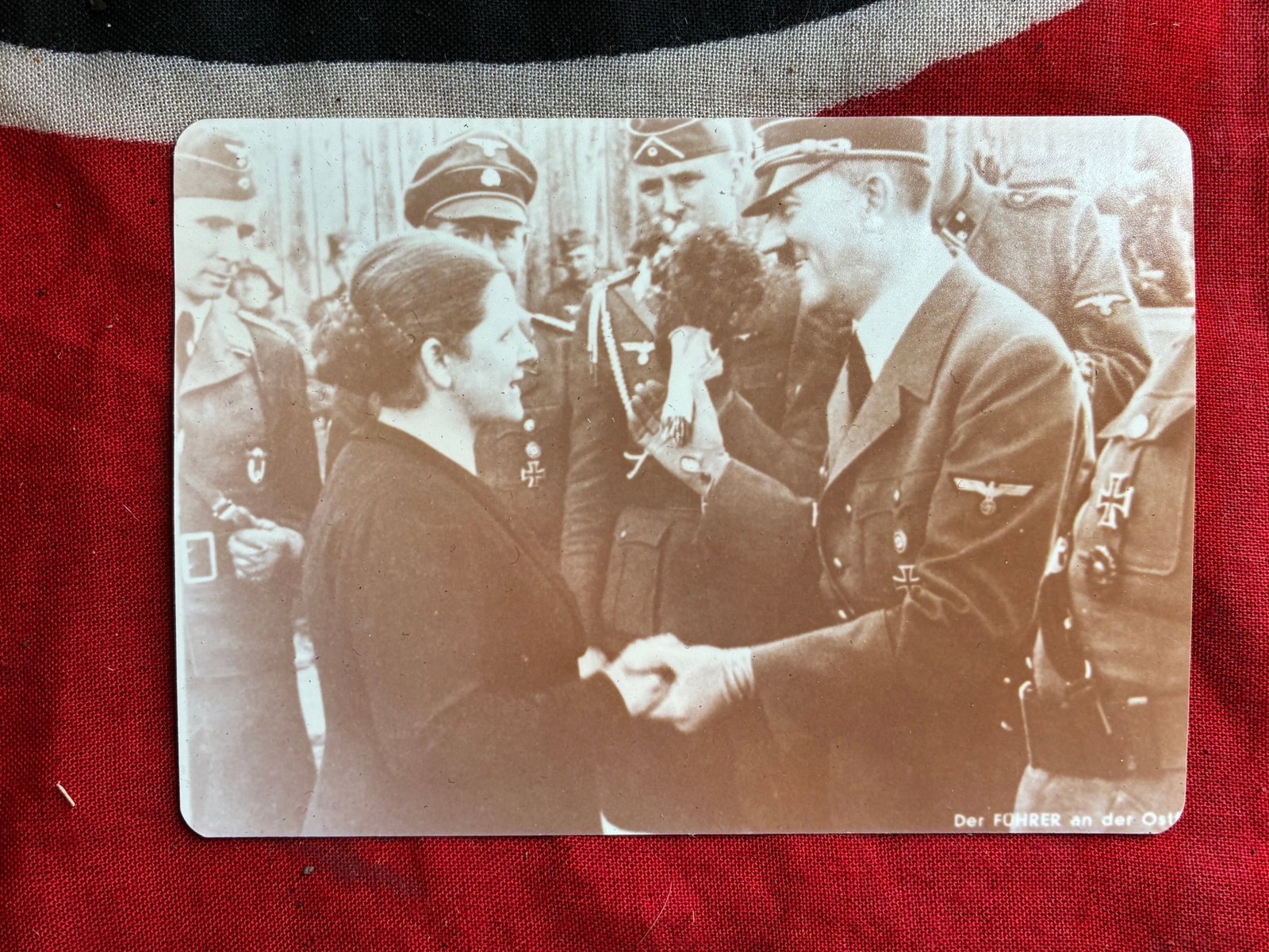WW2 German Photograph of Poland Hitler visiting German Wehrmacht forces: WW2 German Photograph of Poland Hitler visiting German Wehrmacht forces. Poland Hitler visiting German Wehrmacht forces: Hitler talking to a woman; in the background Friedrich Engel (the butcher of Ge