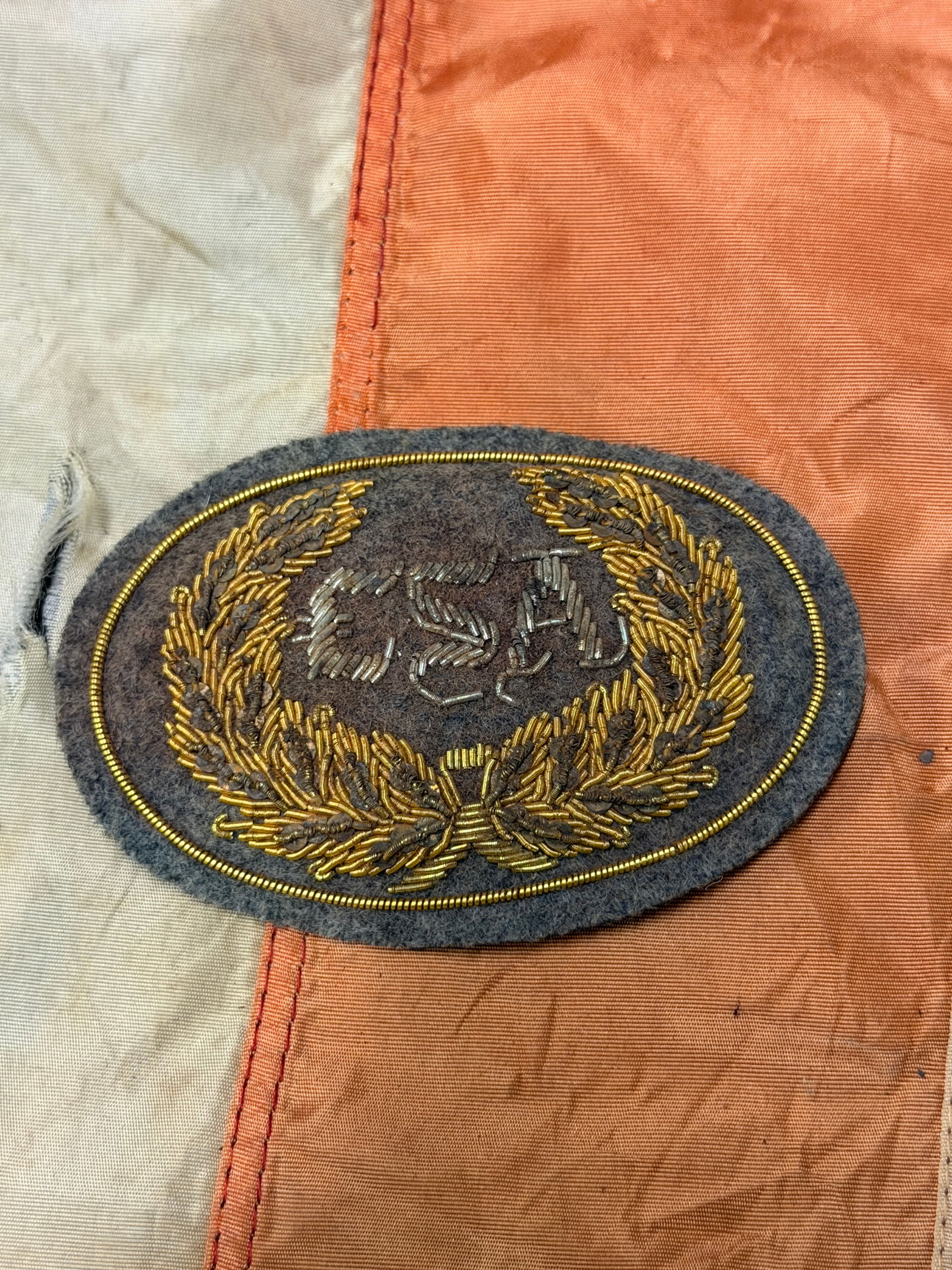 CIVIL WAR CONFEDERATE CSA CS BULLION CLOTH HEADGEAR BADGE BY J.H. SILVEBERG: CIVIL WAR CONFEDERATE CSA CS BULLION CLOTH HEADGEAR BADGE BY J.H. SILVEBERG. A RARE FIND. SHOWS GOOD WEAR AND USE WITH A BEAUTIFUL OVERALL PATINA. HAS A GREAT LOOK TO IT WITH AN EXCELLENT OVERALL EYE