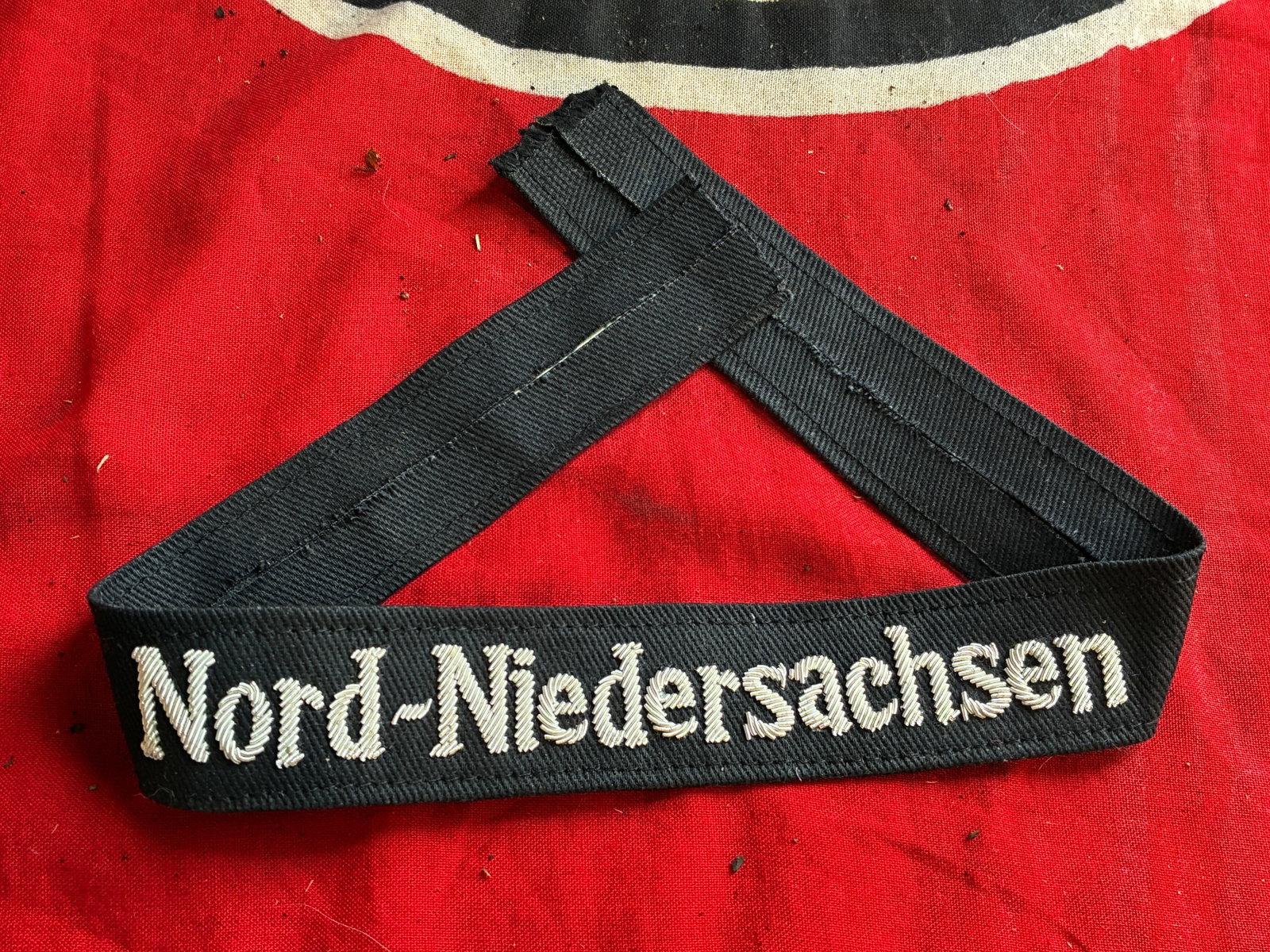 WW2 GERMAN NORD-NIEDERSACHSEN CUFF TITLE: WW2 GERMAN NORD-NIEDERSACHSEN CUFF TITLE. A RARE EXAMPLE THAT IS IN MINT OVERALL SHAPE AND CONDITION WITH A BEAUTIFUL OVERALL PATINA. SHOWS GOOD WEAR AND USE. PLEASE VIEW ALL DETAILED PICTURES. A RARE