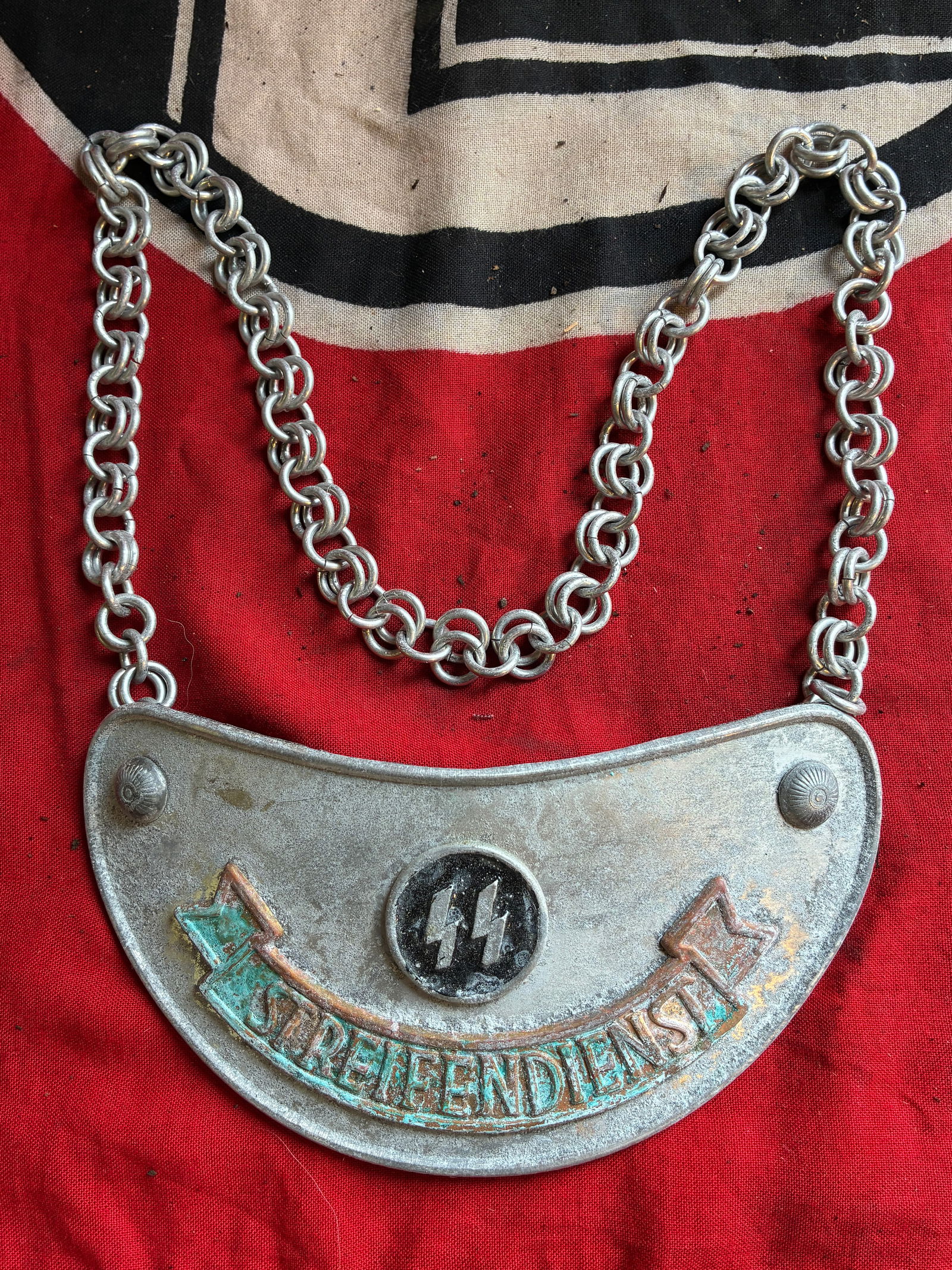 German World War II SS Parade plated gorget: German World War II SS Parade plated gorget. Shows good wear and use with a beautiful overall paitna. Please view all detailed pictures. A rare example of the time period.