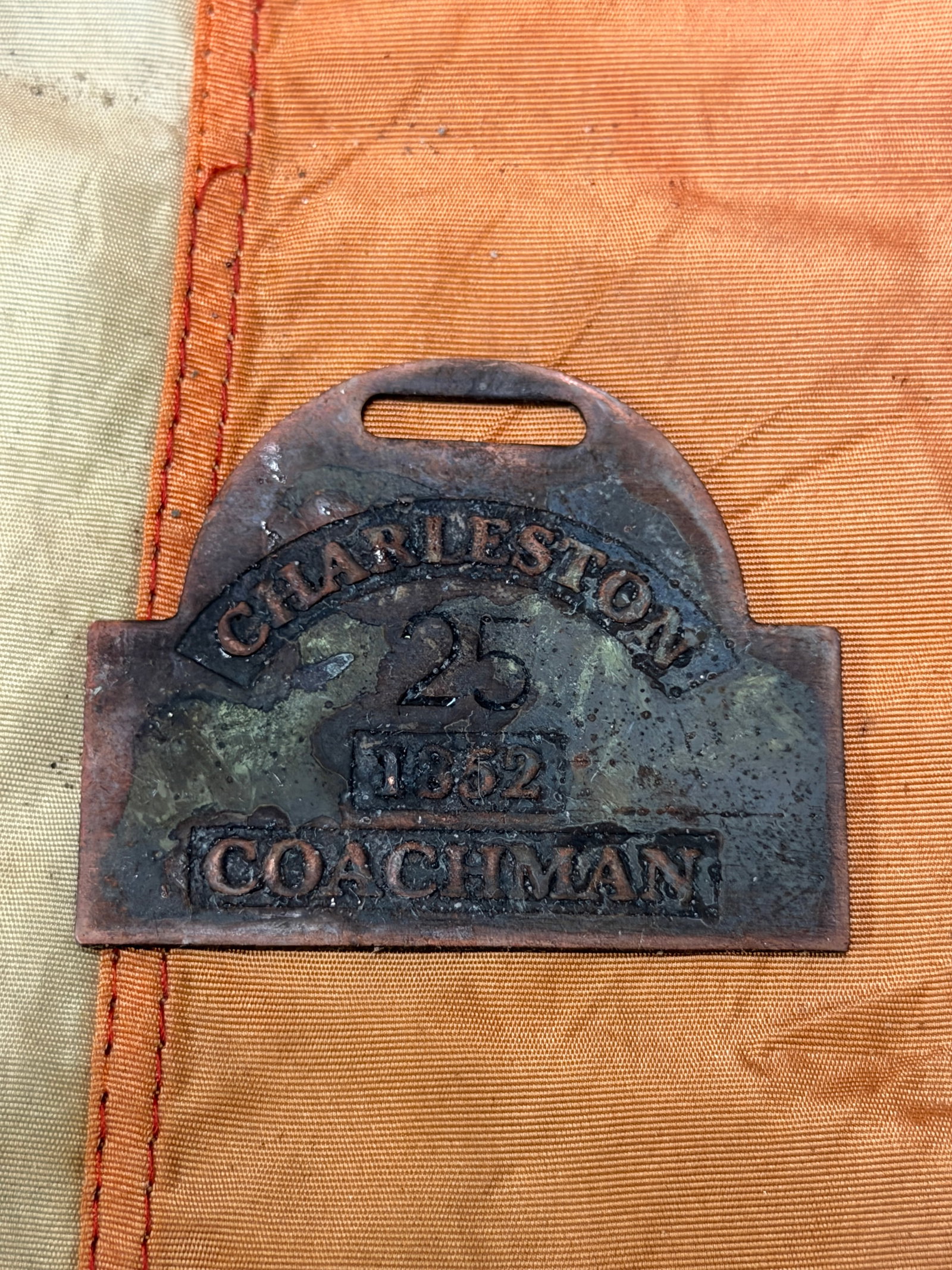 DATED 1852 CHARLESTON #25 COACHMAN SLAVE TAG SERVANT ID: DATED 1852 CHARLESTON #25 COACHMAN SLAVE TAG SERVANT ID. AN ULTRA RARE FIND. SHOWS GOOD WEAR AND USE WITH A BEAUTIFUL OVERALL PATINA. HAS A GREAT LOOK TO IT WITH AN EXCELLENT OVERALL EYE APPEAL. PLEAS