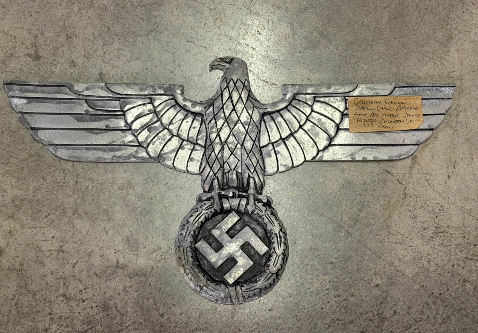 WW2 GERMAN RAILWAY TRAIN STATION EAGLE PLAQUE BROUGHT HOME BY U.S. VET: WW2 GERMAN RAILWAY TRAIN STATION EAGLE PLAQUE BROUGHT HOME BY U.S. VET. COMES WITH THE ATTACHED PROVENANCE. BROUGHT HOME BY MAJOR JAMES ATWOOD ARLINGTON, VA. U.S. ARMY. SHOWS GOOD WEAR AND USE WITH A 