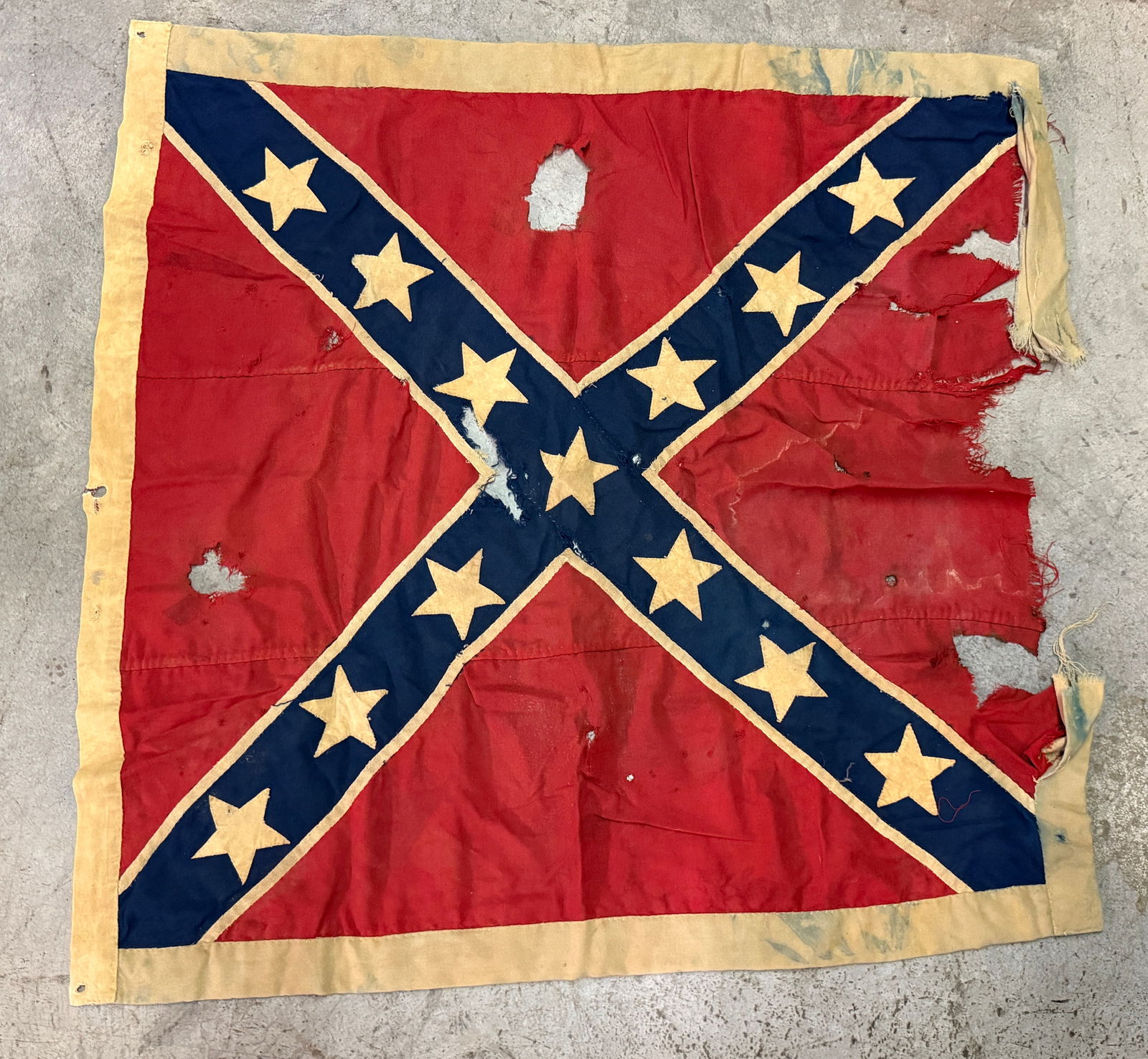BATTLE WORN CIVIL WAR CONFEDERATE CSA 13 STAR BATTLE FLAG: BATTLE WORN CIVIL WAR CONFEDERATE CSA 13 STAR BATTLE FLAG. COMES FROM A HIGH END COLLECTION. THIS FLAG IS TRULY A SHOWPIECE AND ALL HAND SEWN WITH TRACES OF BEING USED IN BATTLE. HAS A GREAT LOOK TO I