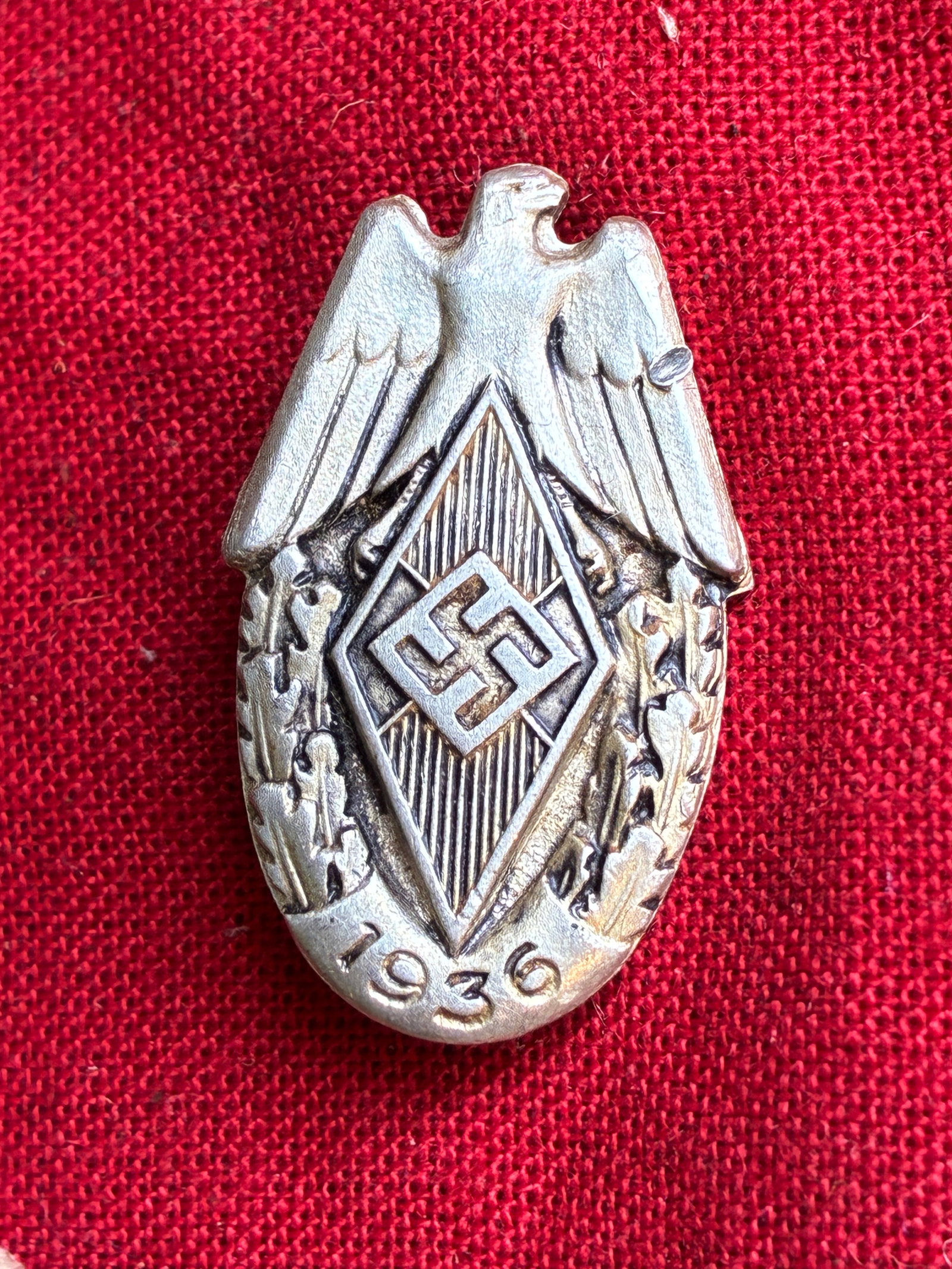 WW2 German Hitler Youth HJ 1937 Event Day Badge: WW2 German Hitler Youth HJ 1937 Event Day Badge. In mint overall shape and condition with a beautiful overall patina. Please view all detailed pictures. A rare example of the time period.