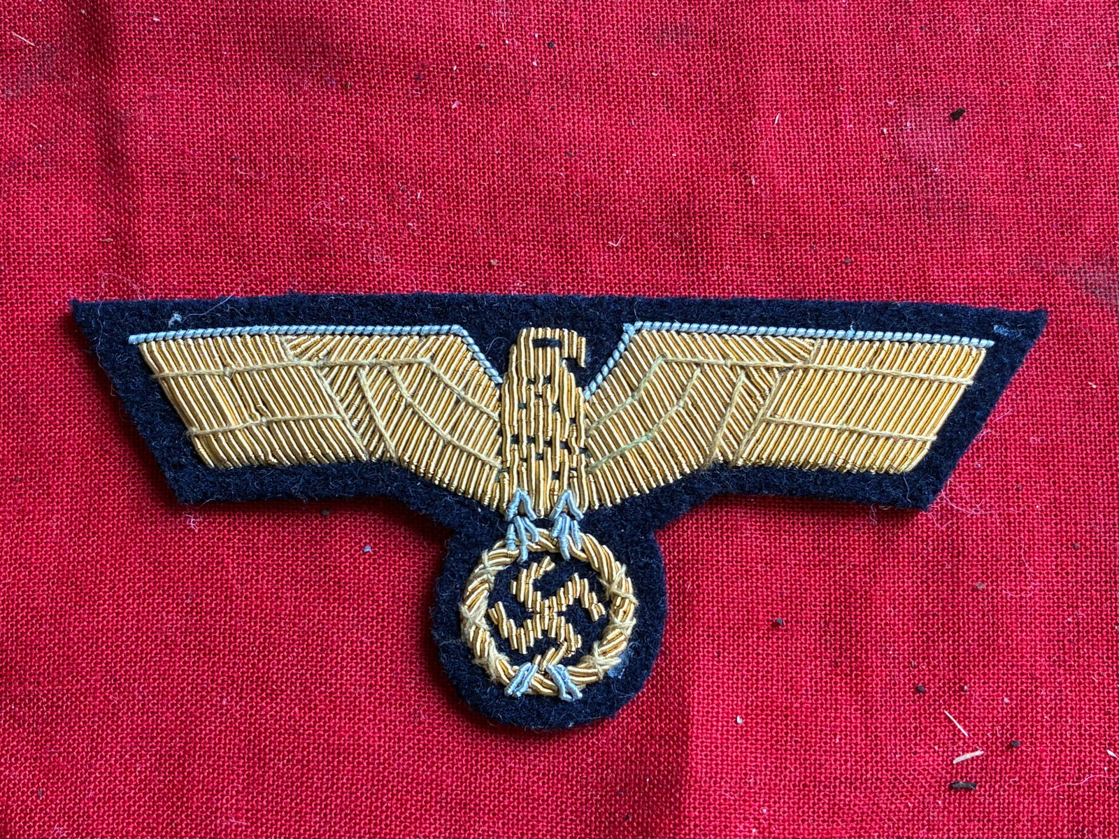 Vet Bring Back WW2 German Kriegsmarine Officers Breast Eagle: Vet Bring Back WW2 German Kriegsmarine Officers Breast Eagle. Kriegsmarine Officers breast eagle gold on dark blue wool. A rare find.