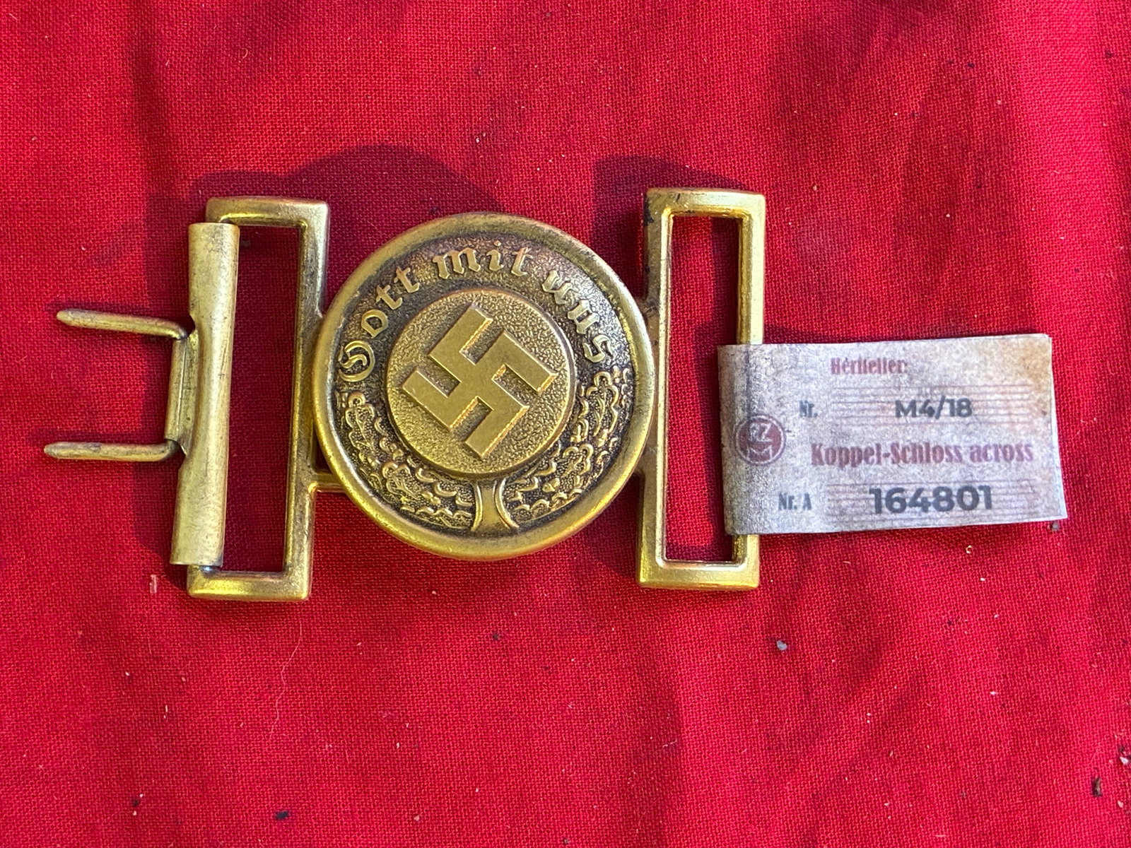 WW2 GRMAN POLICE 2-PIECE BELT BUCKLE WITH RZM TAG ATTACHED: WW2 GRMAN POLICE 2-PIECE BELT BUCKLE WITH RZM TAG ATTACHED. A RARE FIND. SHOWS GOOD WEAR AND USE WITH A BEAUTIFUL OVERALL PATINA. PLEASE VIEW ALL DETAILED PICTURES. A RARE EXAMPLE.