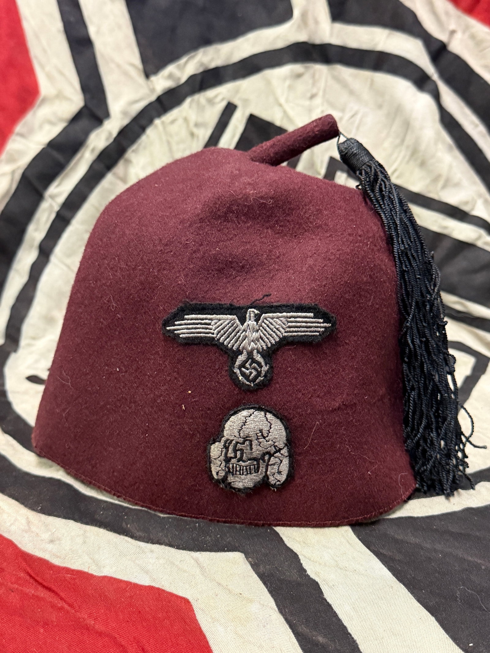 German WWII 13th Waffen SS Mountain Division Handschar M43 Foreign Volunteer Maroon Parade Fez with: German WWII 13th Waffen SS Mountain Division Handschar M43 Foreign Volunteer Maroon Parade Fez with Tassel & Sweatband. This is a maroon fez that was part of the dress parade uniform of the 13th Waffe