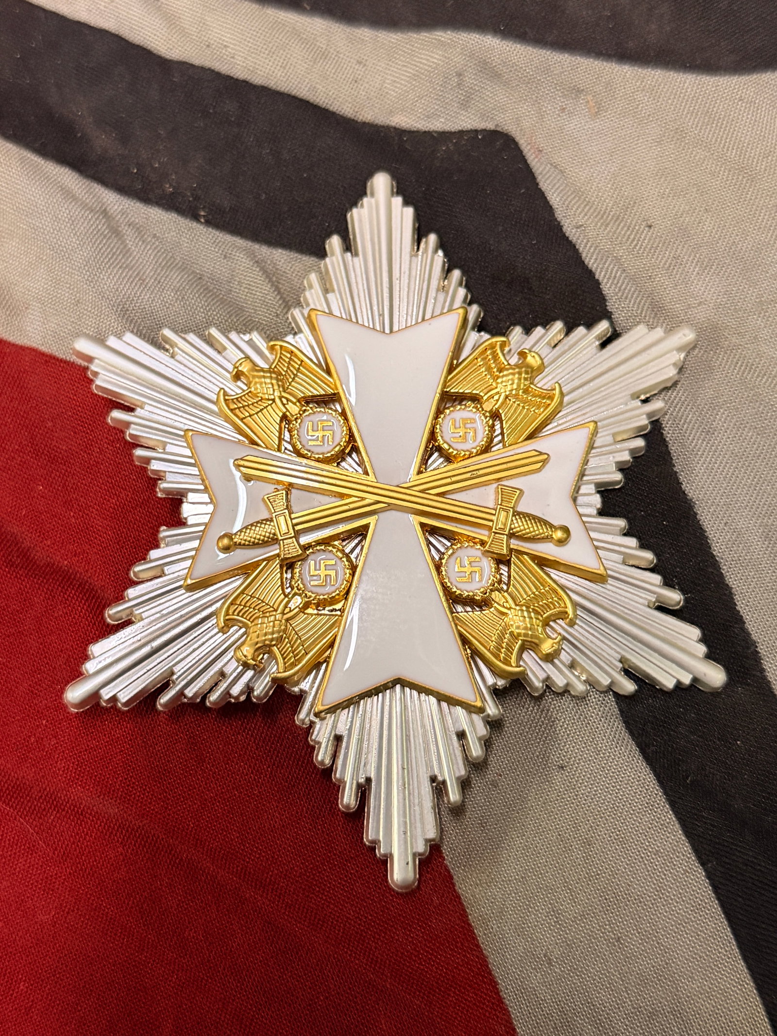 WWII GERMAN GRAND CROSS OF THE GERMAN EAGLE WITH SERIAL # 90021: WWII GERMAN GRAND CROSS OF THE GERMAN EAGLE WITH SERIAL # 90021. A RARE FIND. IT IS IN MINT OVERALL SHAPE AND CONDITION WITH A BEAUTIFUL OVERALL PATINA. SHOWS GOOD WEAR AND USE. PLEASE VIEW ALL DETAIL