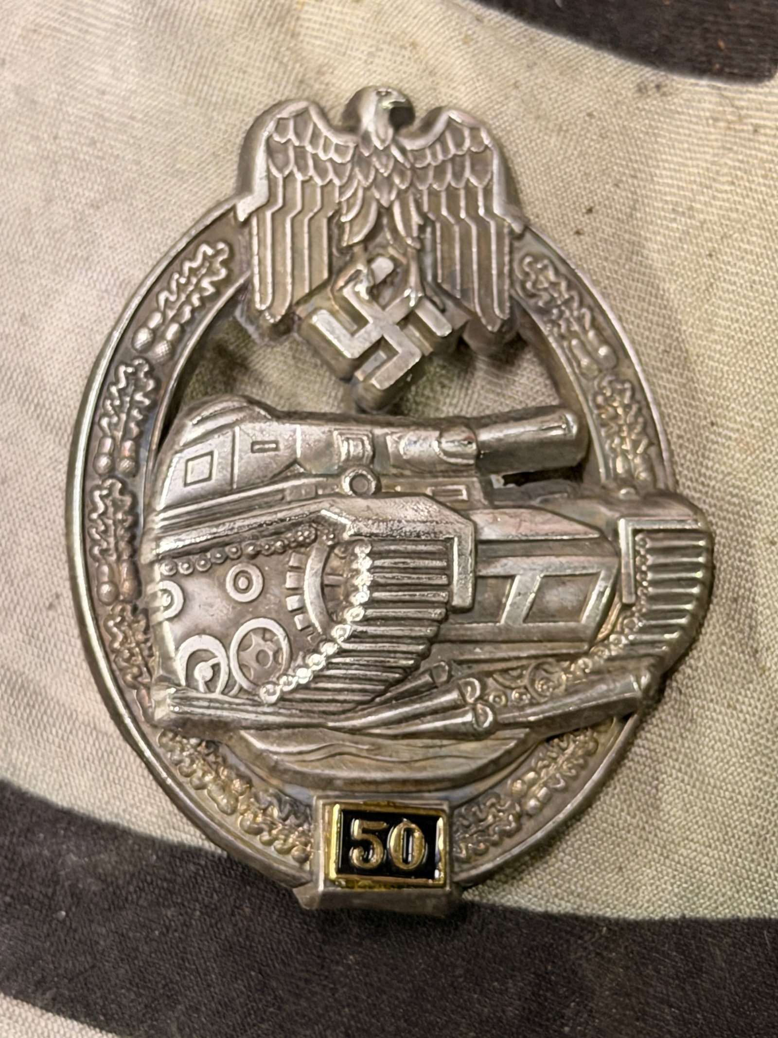 Early WW2 German Numbered panzer assault badge 50 – Josef Felix & Söhne, Gablonz: Early WW2 German Numbered panzer assault badge 50 – Josef Felix & Söhne, Gablonz. Numbered panzer assault badge 50 – Josef Felix & Söhne, Gablonz. Zinc wreath with zinc riveted eagle. Remains in
