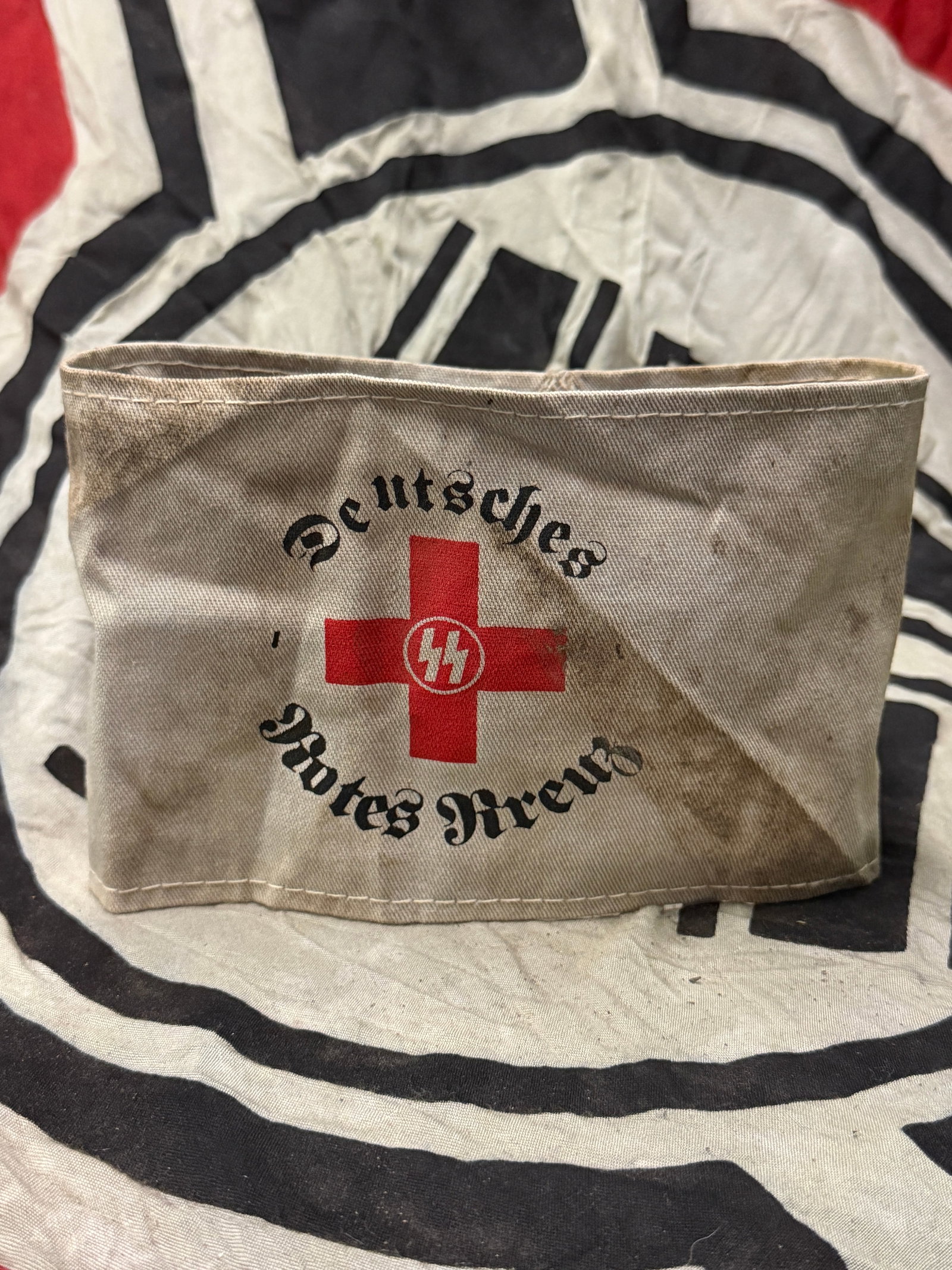 WWII German DRK Deutsches Rotes Kreuz Waffen SS armband: WWII German DRK Deutsches Rotes Kreuz Waffen SS armband. A very rare and well used armband that is in mint overall shape and condition with a beautiful overall patina. Shows good wear and use. A rare 