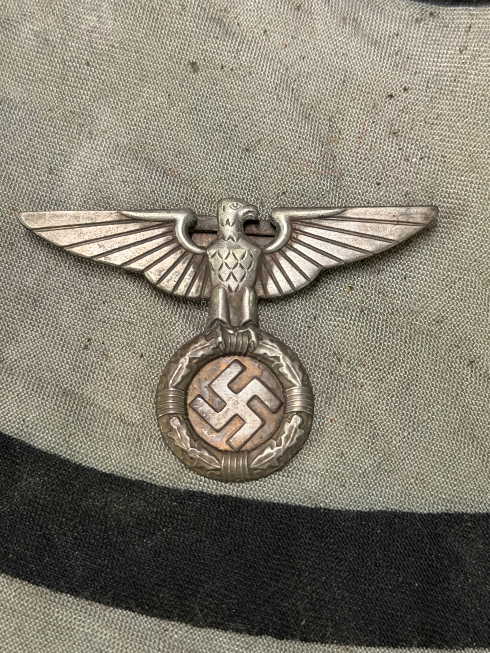 German NSDAP (NAZI PARTY) Or SS 1934 PATTERN POLITICAL CAP EAGLE. (Mützen Adler): German NSDAP (NAZI PARTY) Or SS 1934 PATTERN POLITICAL CAP EAGLE. (Mützen Adler). Allegedly the first pattern Third Reich political national eagle was personally designed by Adolf Hitler himself and 