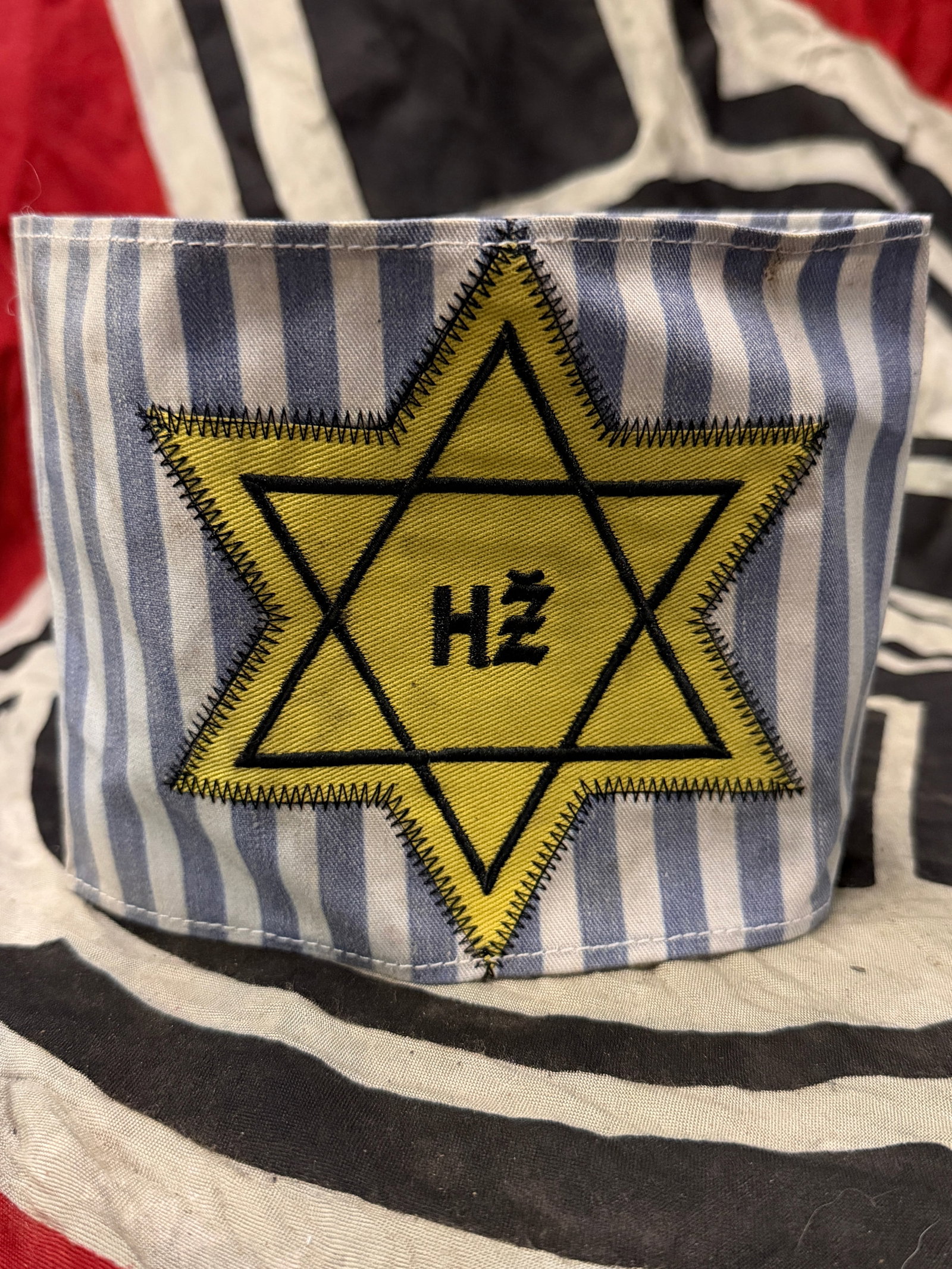 Rare WW2 German HZ Slovakia Star Of David Armband: Rare WW2 German HZ Slovakia Star Of David Armband. An ultra rare find that is in well worn shape and condition with a beautiful overall patina. Shows good wear and use. Please view all detailed pictur