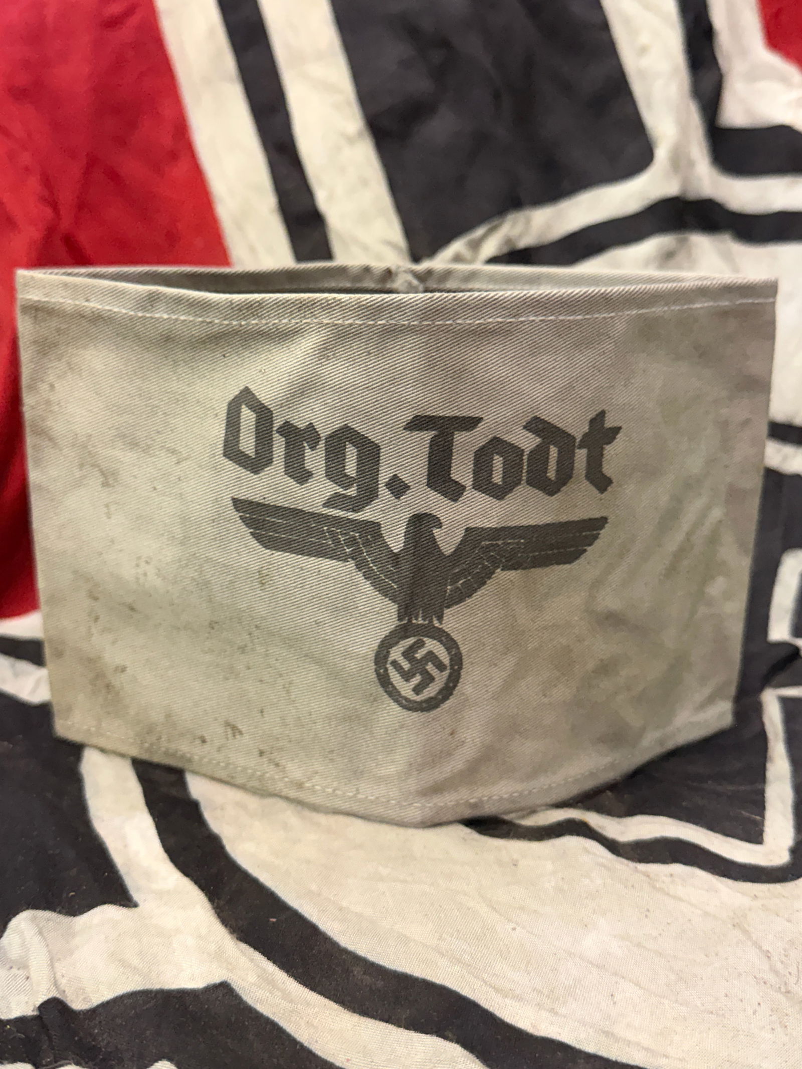 WW2 GERMAN ORG. TODT ORGANISATION TODT ARMBAND WITH RZM PAPER TAG: WW2 GERMAN ORG. TODT ORGANISATION TODT ARMBAND WITH RZM PAPER TAG. AN ULTRA RARE FIND THAT IS IN MINT OVERALL SHAPE AND CONDITION WITH A BEAUTIFUL OVERALL PATINA. SHOWS GOOD WEAR AND USE. PLEASE VIEW