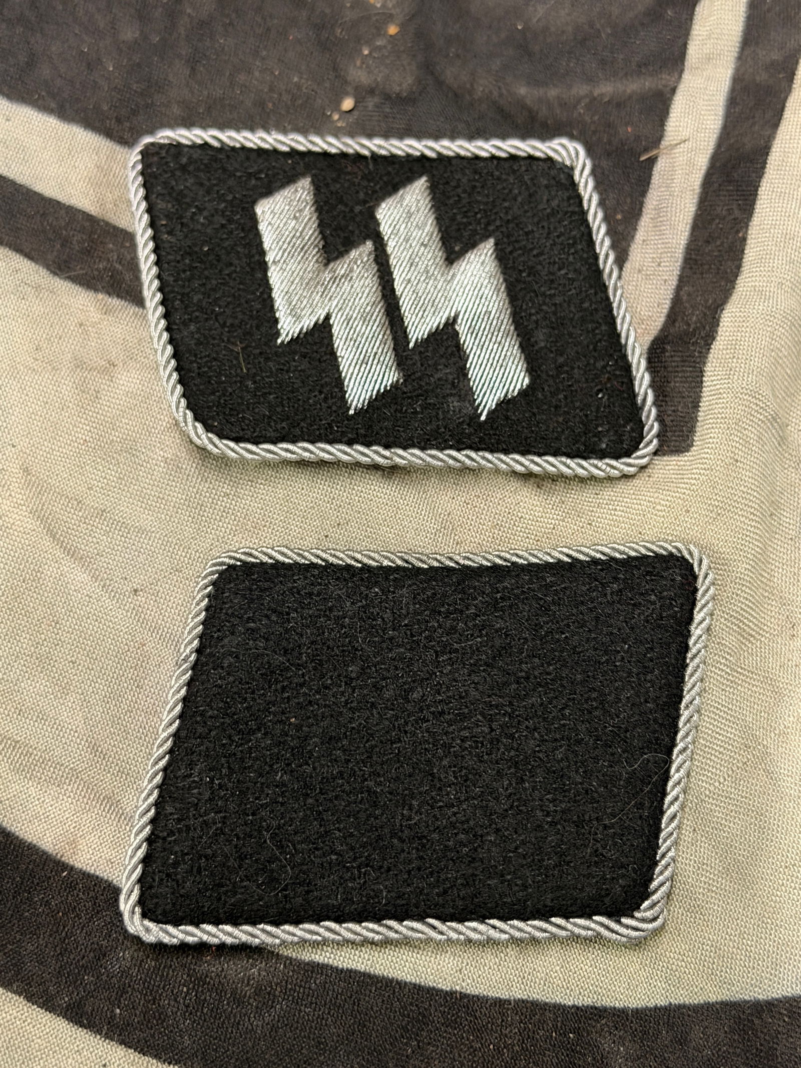 RARE PAIR OF WW2 GERMAN WAFFEN SS COLLAR TABS WITH RZM PAPER TAG: RARE PAIR OF WW2 GERMAN WAFFEN SS COLLAR TABS WITH RZM PAPER TAG. A VERY RARE EXAMPLE THAT IS IN MINT OVERALL SHAPE AND CONDITION WITH A BEUATIFUL OVERALL PATINA. SHOWS GOOD WEAR AND USE. PLEASE VIEW