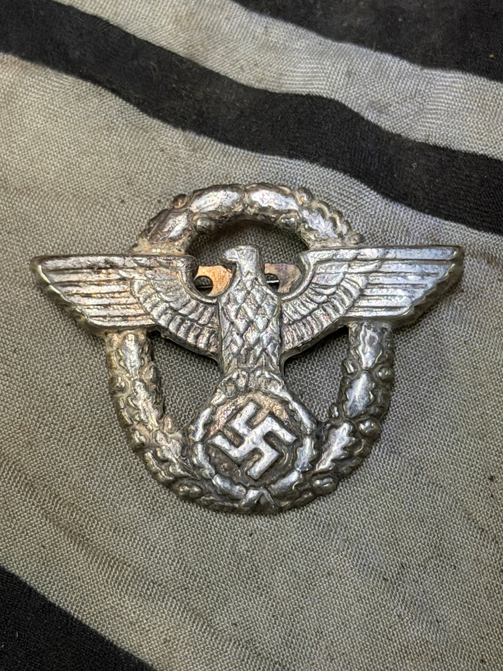 WW2 German NSDAP (NAZI PARTY) Type-2 POLICE VISOR CAP EAGLE (Mützenadler): WW2 German NSDAP (NAZI PARTY) Type-2 POLICE VISOR CAP EAGLE (Mützenadler). A very rare example that is in mint overall shape and condition with a beautiful overall patina. Shortly after Adolf Hitler 
