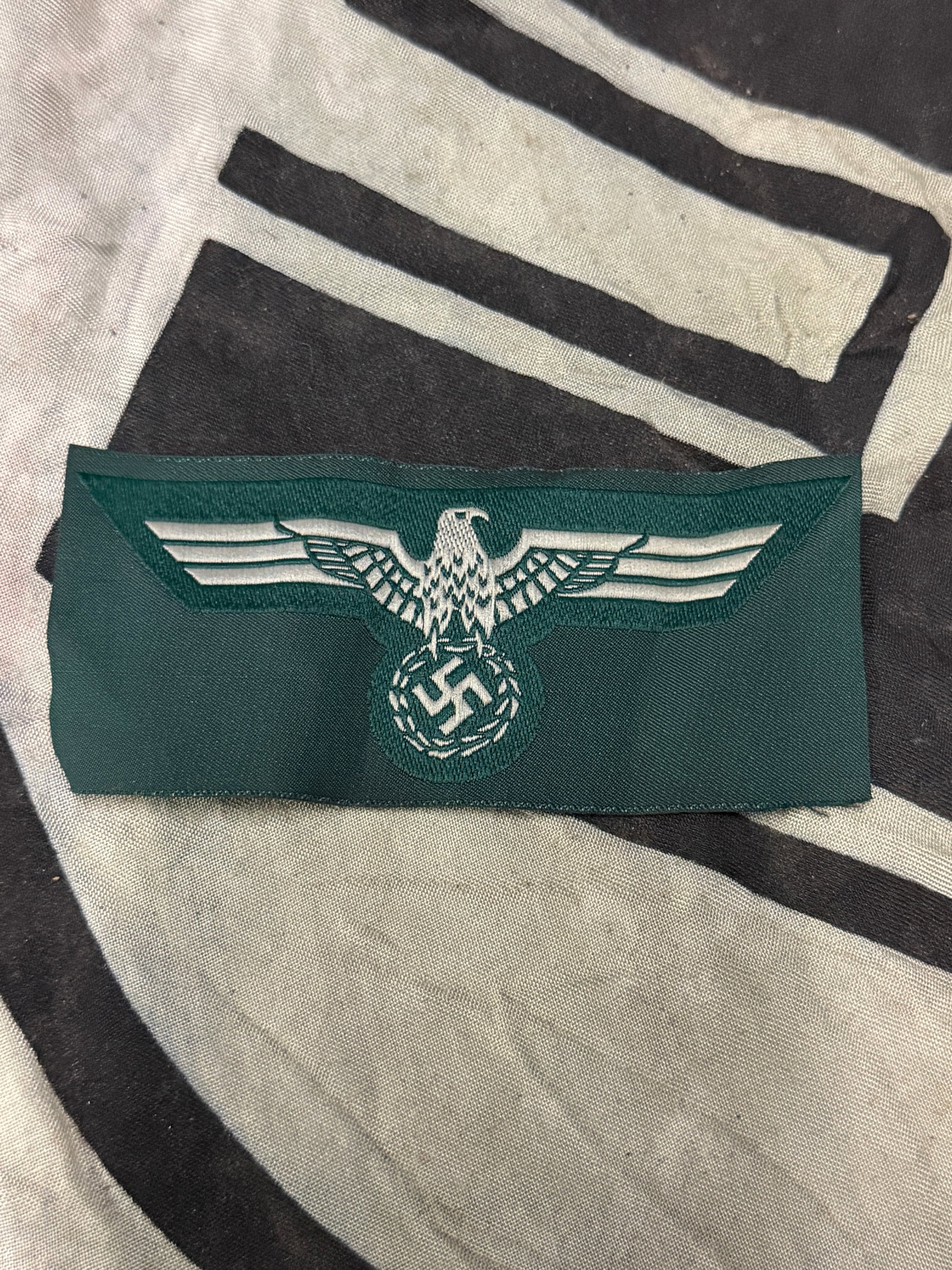 WWII German Army (Heer) EM/NCO M-36 Breast Eagle: WWII German Army (Heer) EM/NCO M-36 Breast Eagle. The German army originally adopted a slightly modified version of the NSDAP’s national eagle by order on February 17TH 1934, with instructions to ha