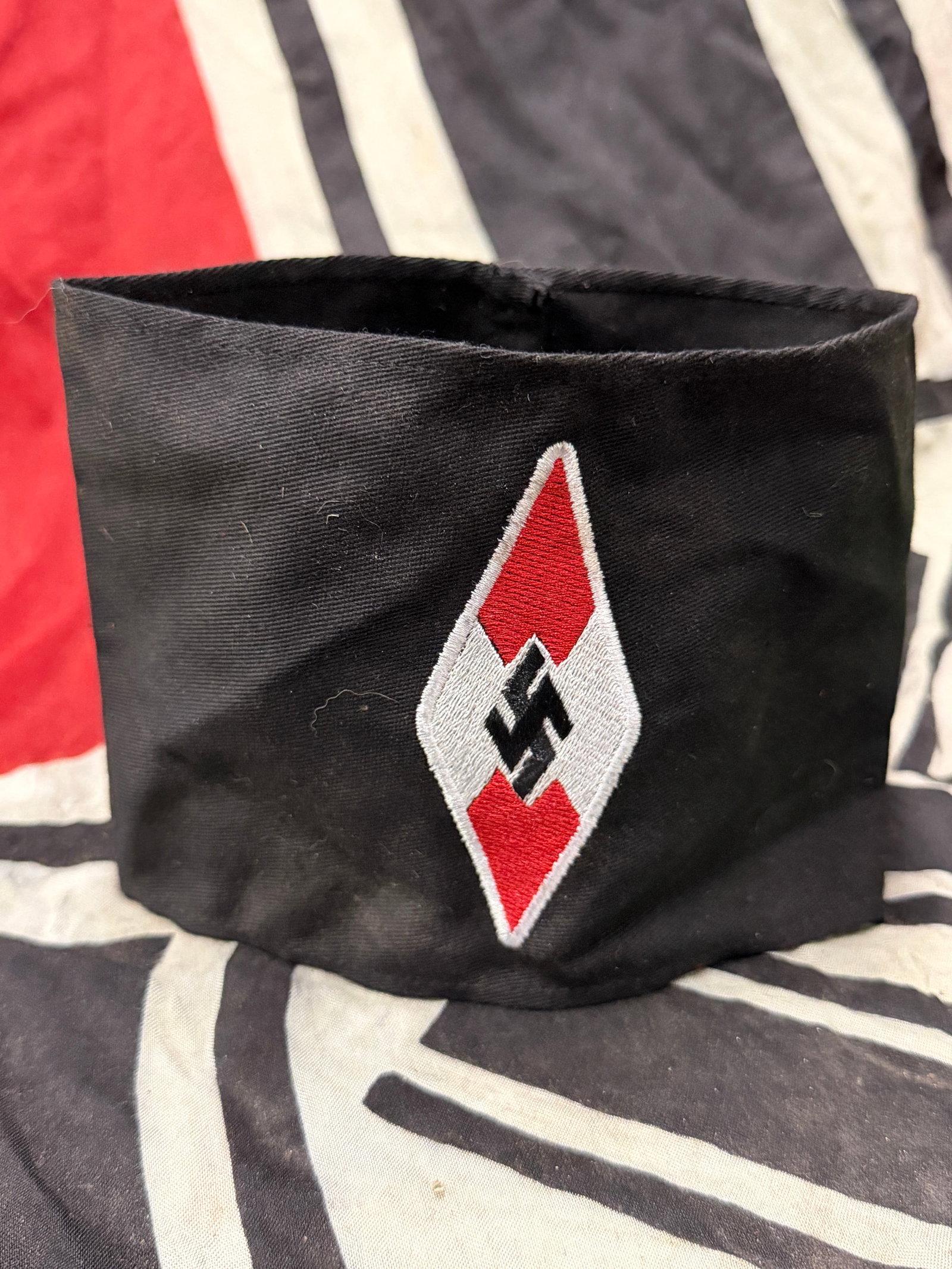 RARE WW2 GERMAN HJ HITLER YOUTH LEADERS ARMBAND: RARE WW2 GERMAN HJ HITLER YOUTH LEADERS ARMBAND. A VERY RARE FIND. SHOWS GOOD WEAR AND USE WITH A BEAUTIFUL OVERALL PATINA. PLEASE VIEW ALL DETAILED PICTURES. A RARE FIND.