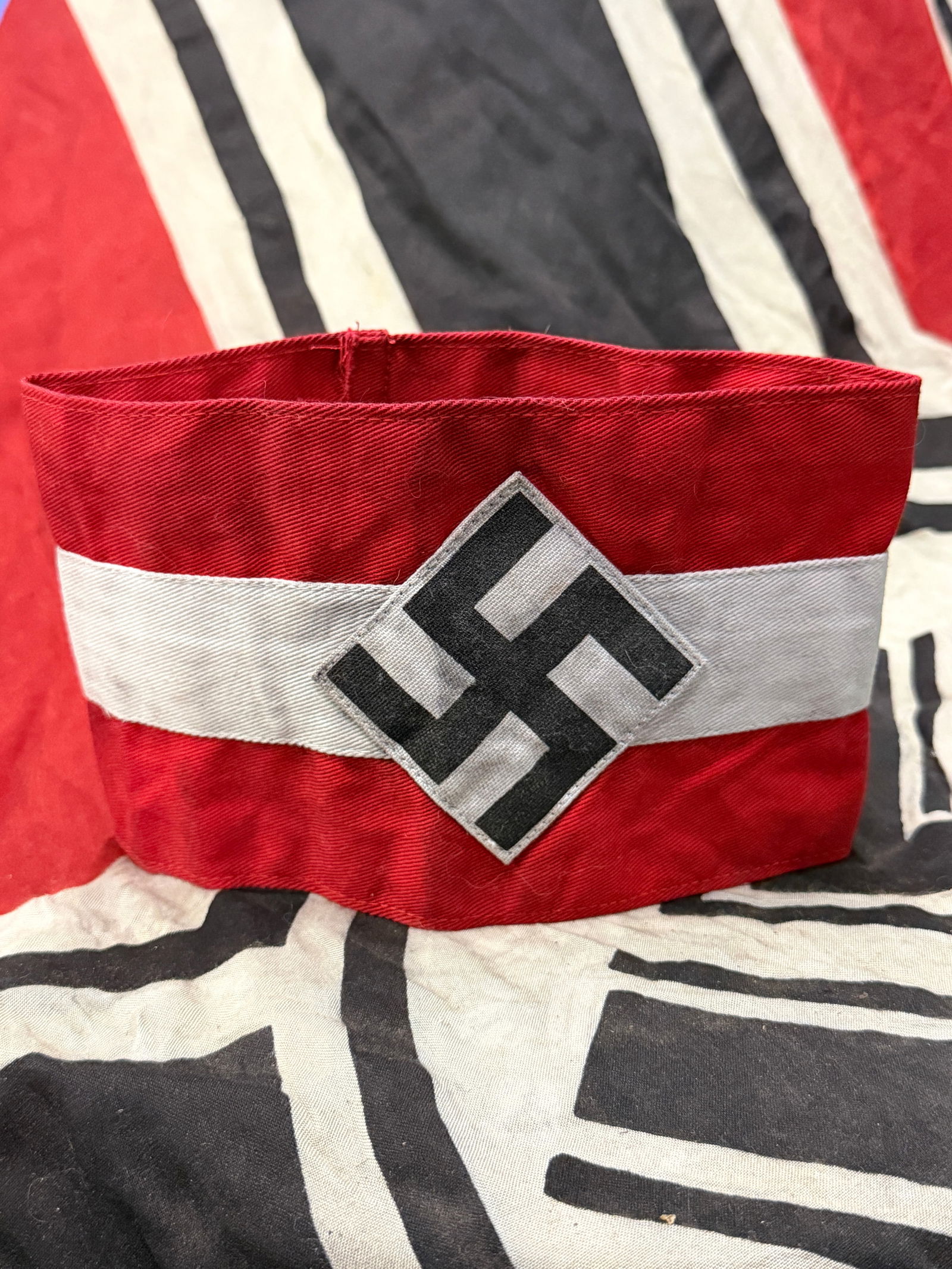 RARE WW2 GERMAN HJ HITLER YOUTH ARMBAND WITH RZM PAPER TAG: RARE WW2 GERMAN HJ HITLER YOUTH ARMBAND WITH RZM PAPER TAG. A RARE FIND. SHOWS GOOD WEAR AND USE WITH A BEAUTIFUL OVERALL PATINA. PLEASE VIEW ALL DETAILED PICTURES. A RARE EXAMPLE OF THE TIME PERIOD.